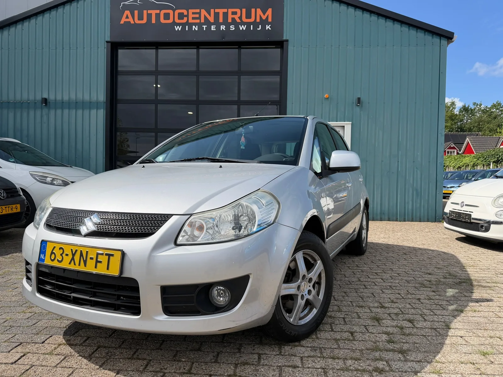 Suzuki SX4 (2007) — foto 1