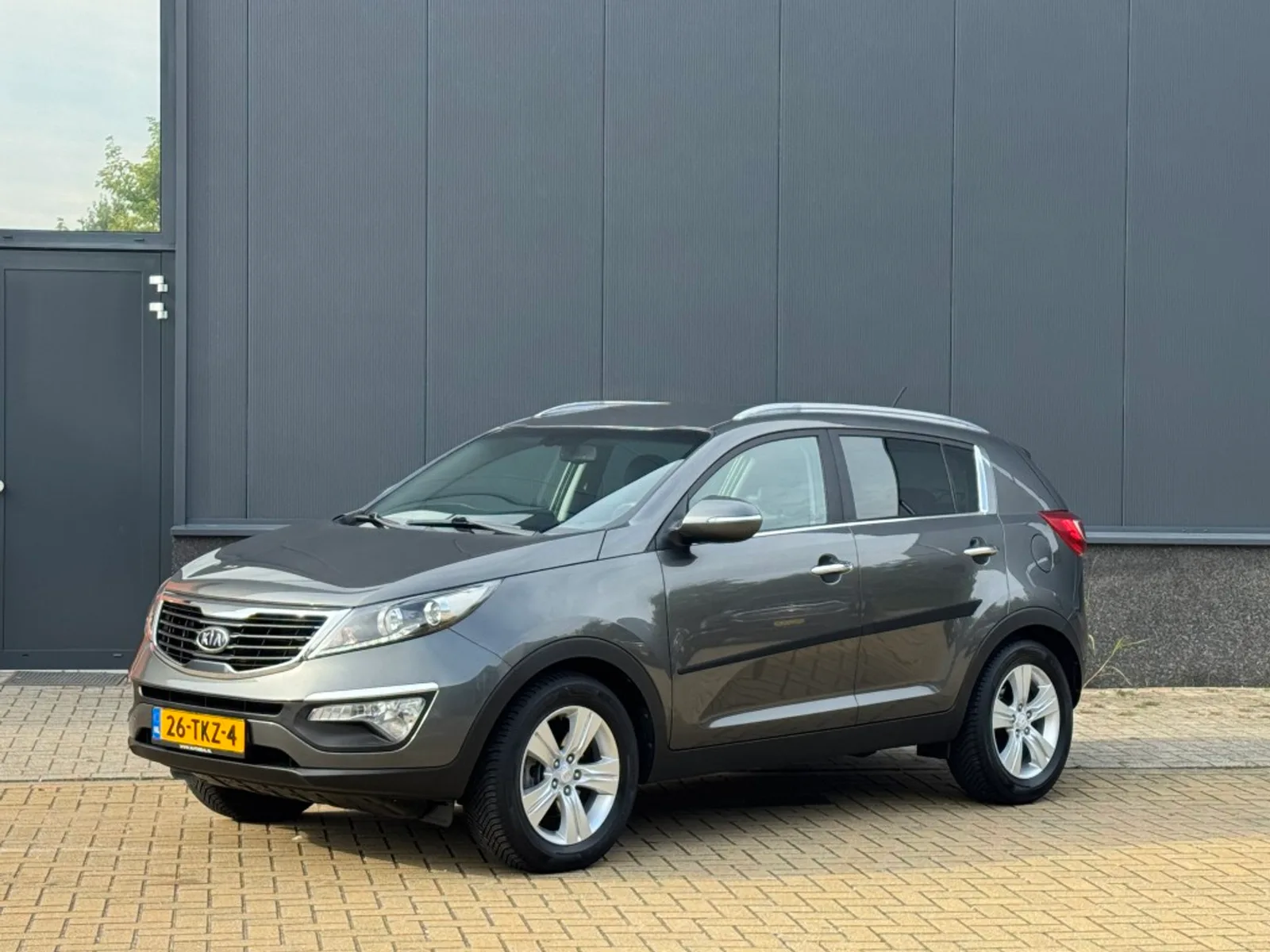 Kia Sportage (2012) — foto 1