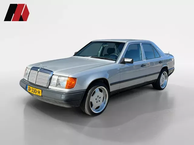 Mercedes-Benz 200-Serie (1986) — foto 1
