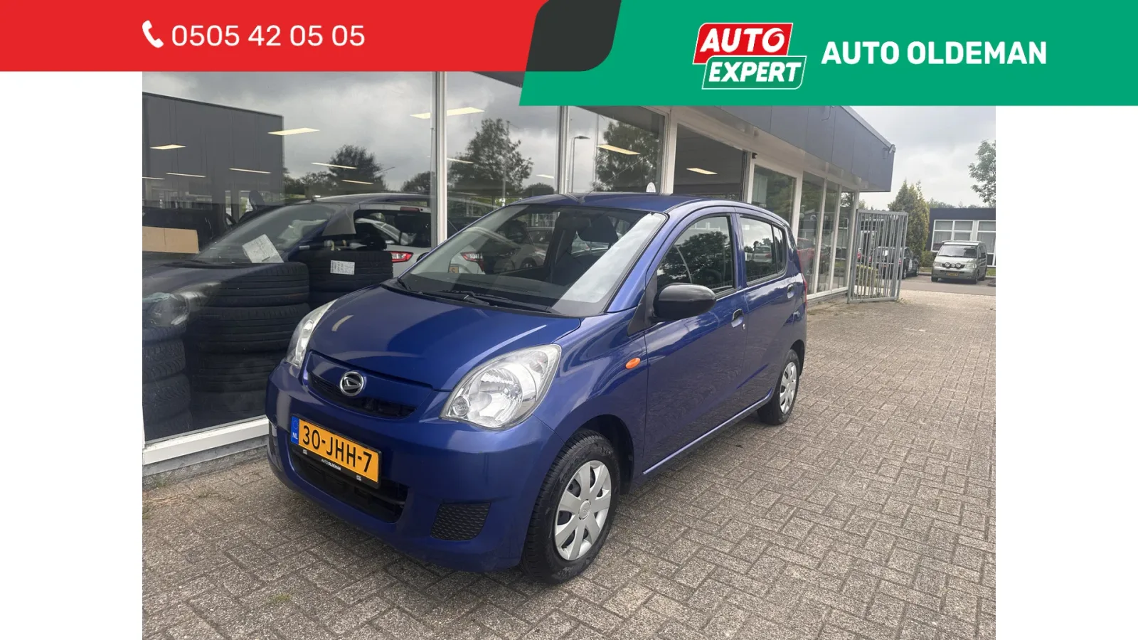 Daihatsu Cuore (2009) — foto 1
