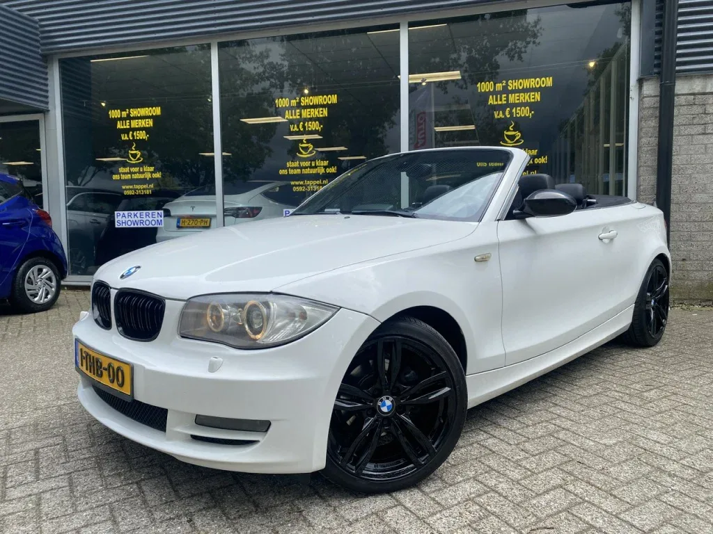 BMW 1-Serie (2009) — foto 1