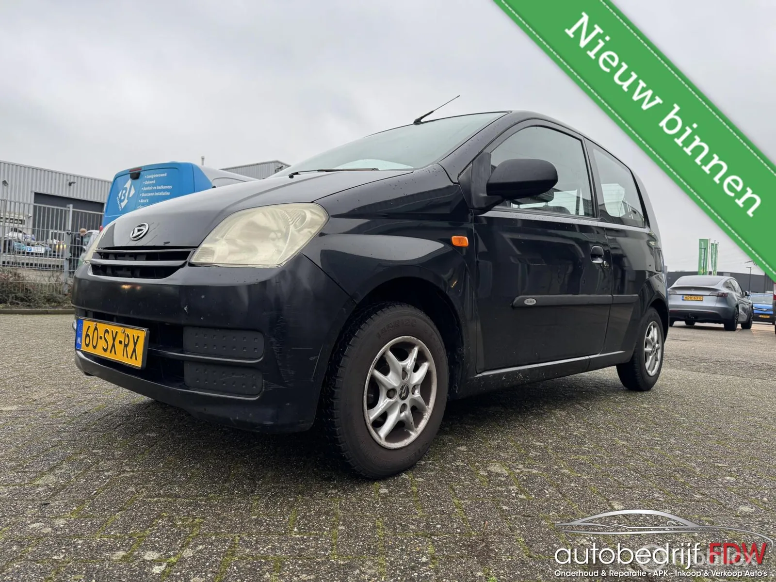 Daihatsu Cuore (2006) — foto 1