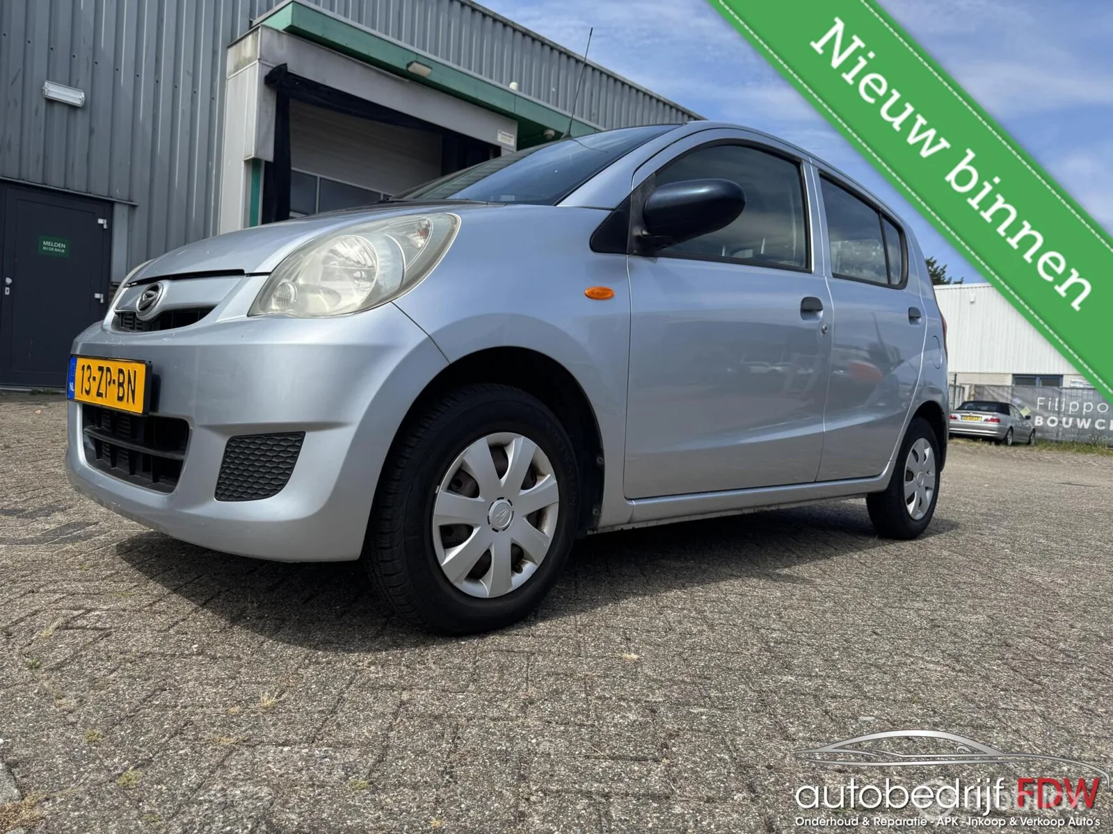 Daihatsu Cuore (2008) — foto 1