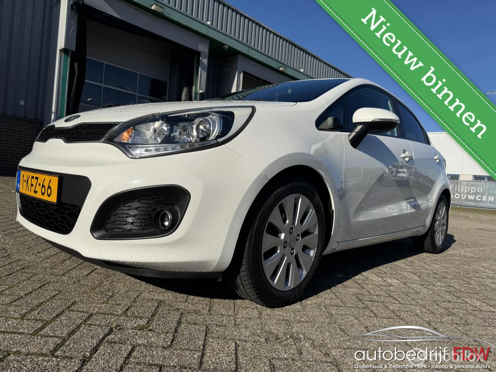 Kia Rio (2013) — foto 1
