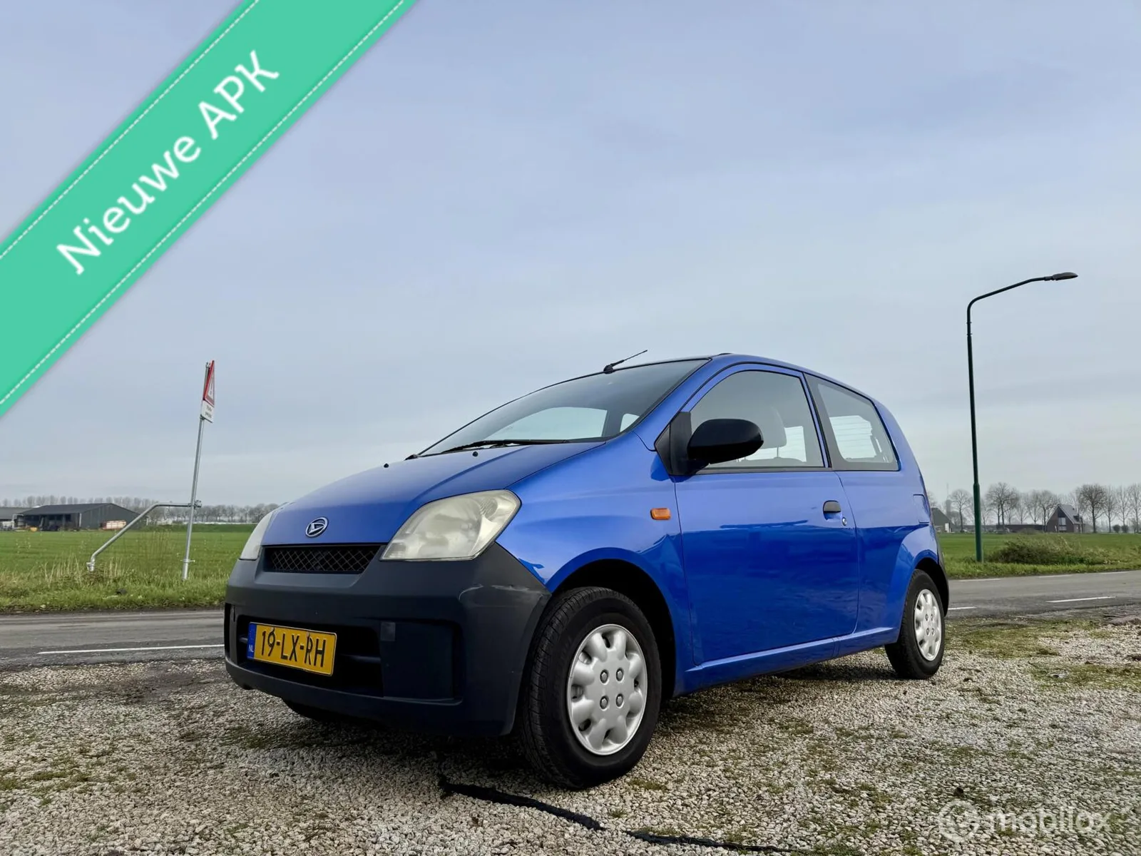 Daihatsu Cuore (2003) — foto 1