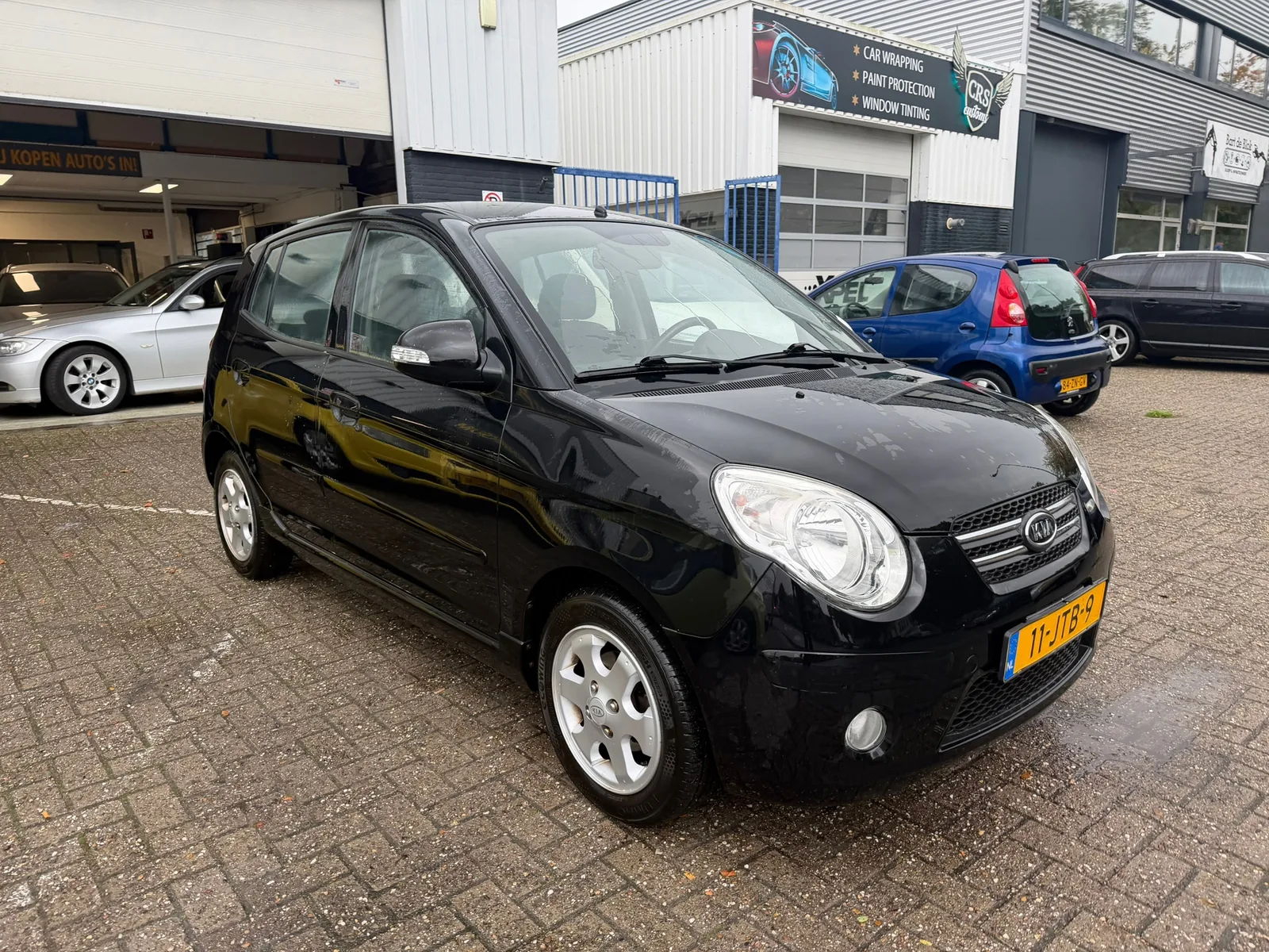 Kia Picanto (2009) — foto 1
