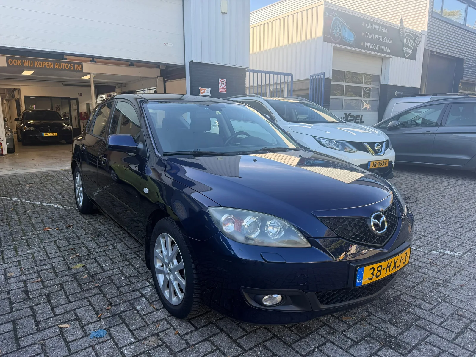 Mazda 3 (2009) — foto 1