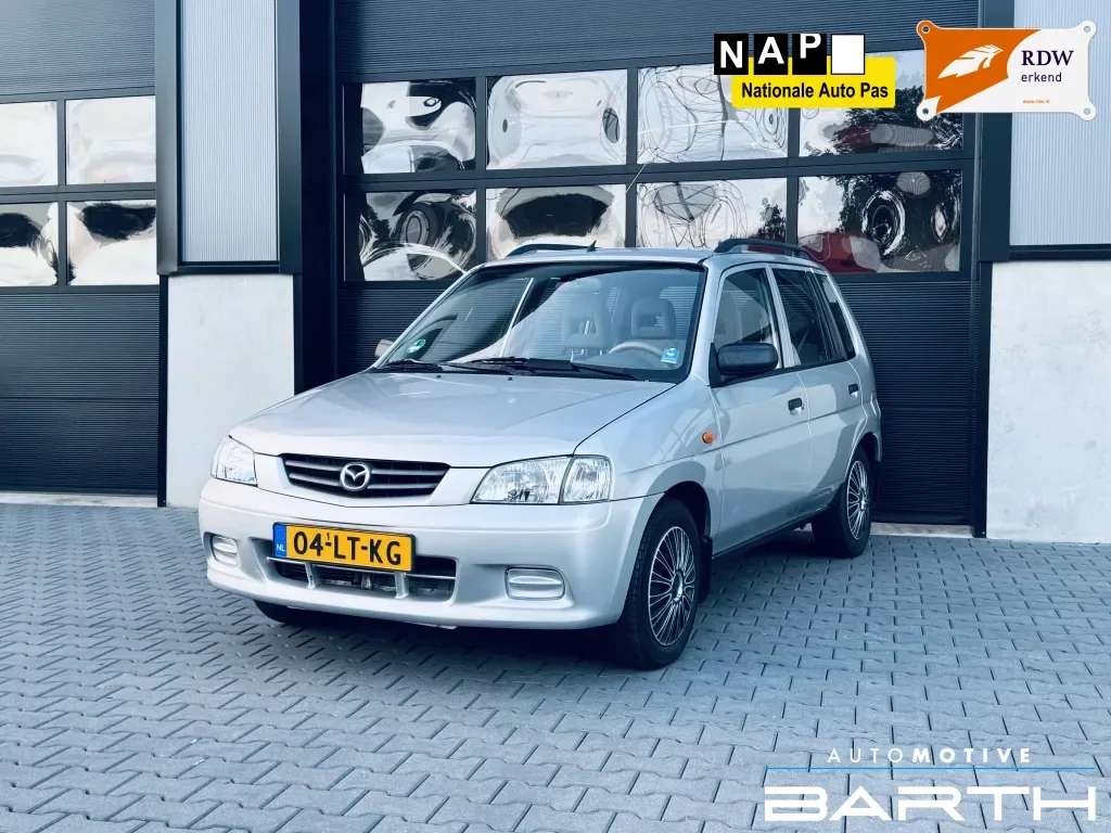 Mazda Demio (2003) — foto 1