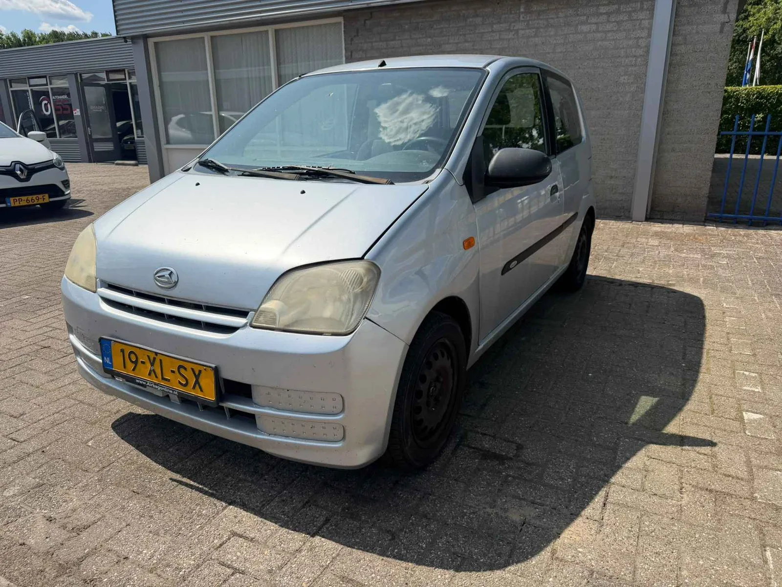 Daihatsu Cuore (2007) — foto 1