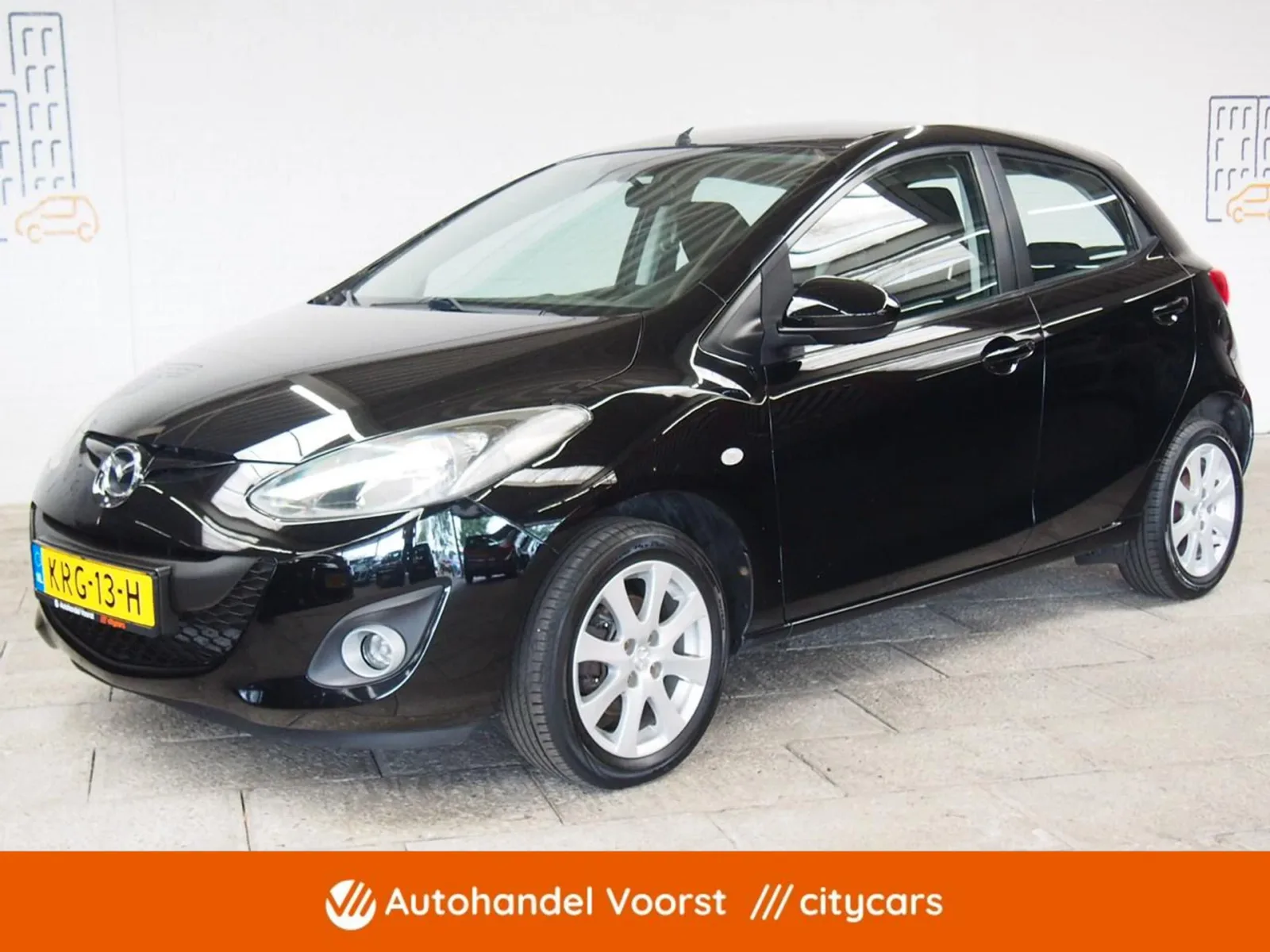 Mazda 2 (2013) — foto 1