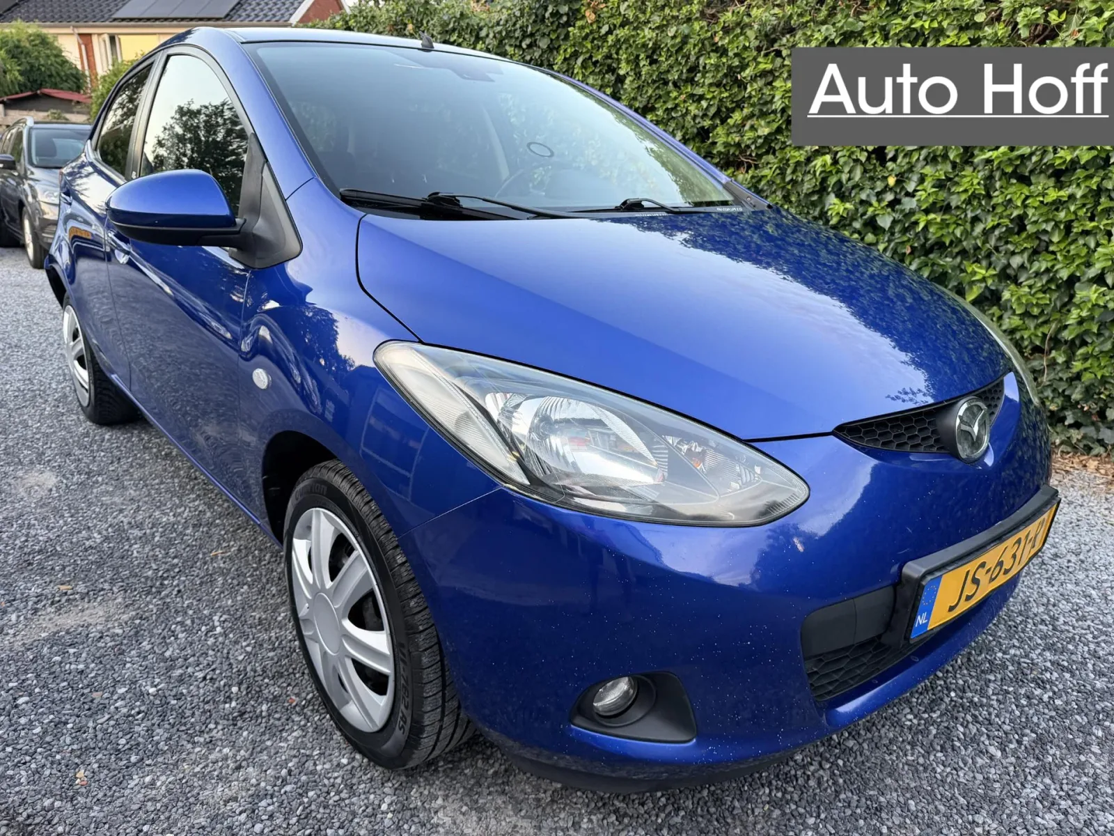 Mazda 2 (2009) — foto 1