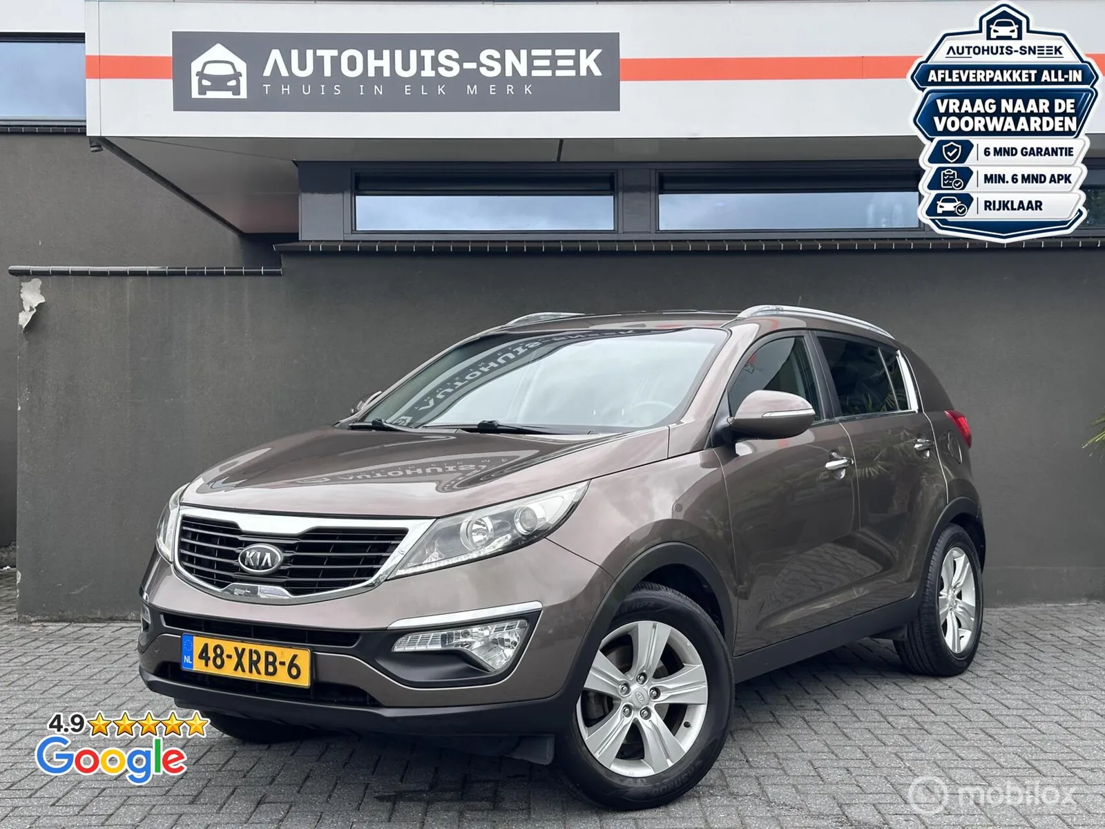 Kia Sportage (2012) — foto 1