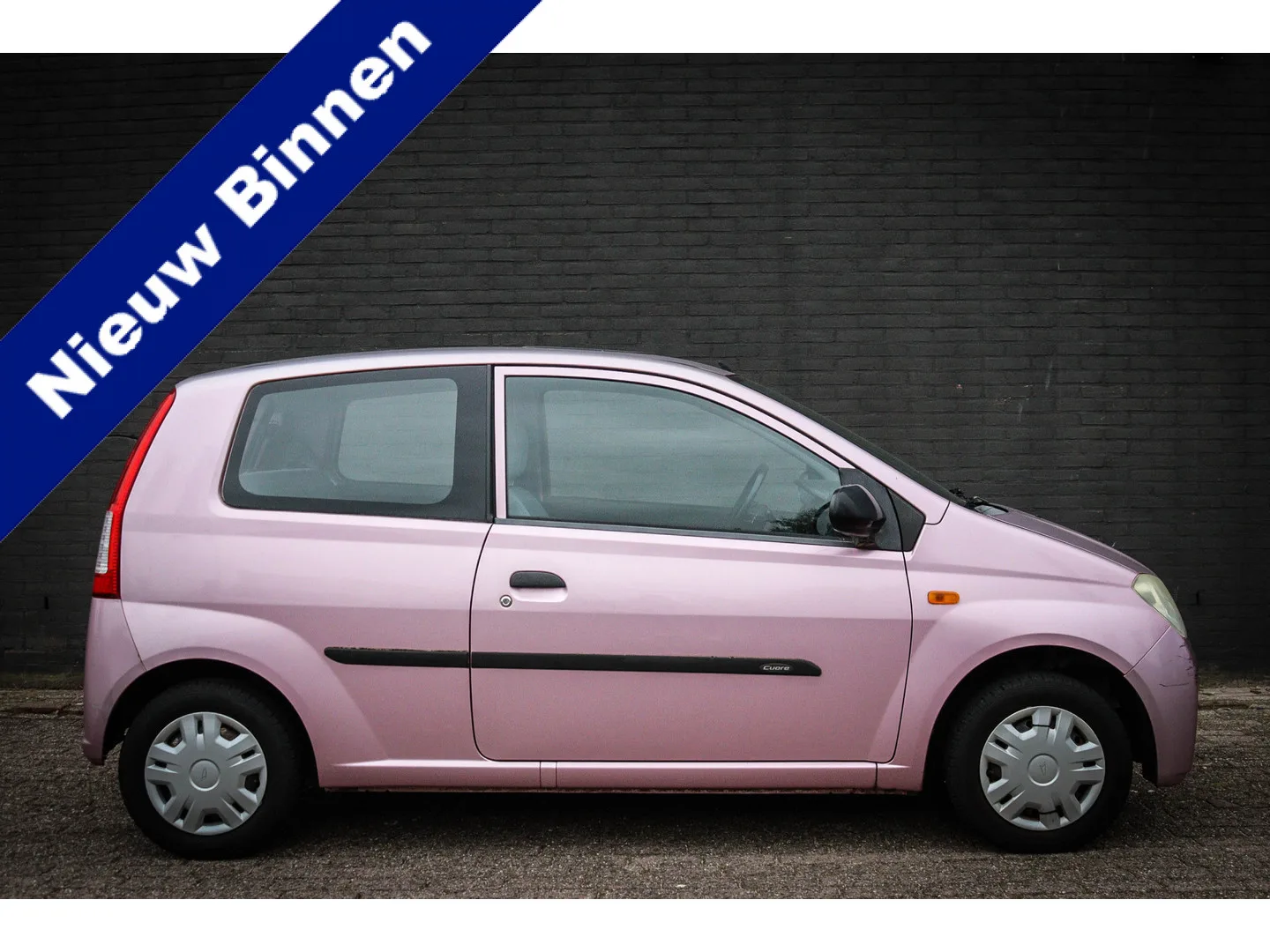 Daihatsu Cuore (2003) — foto 1