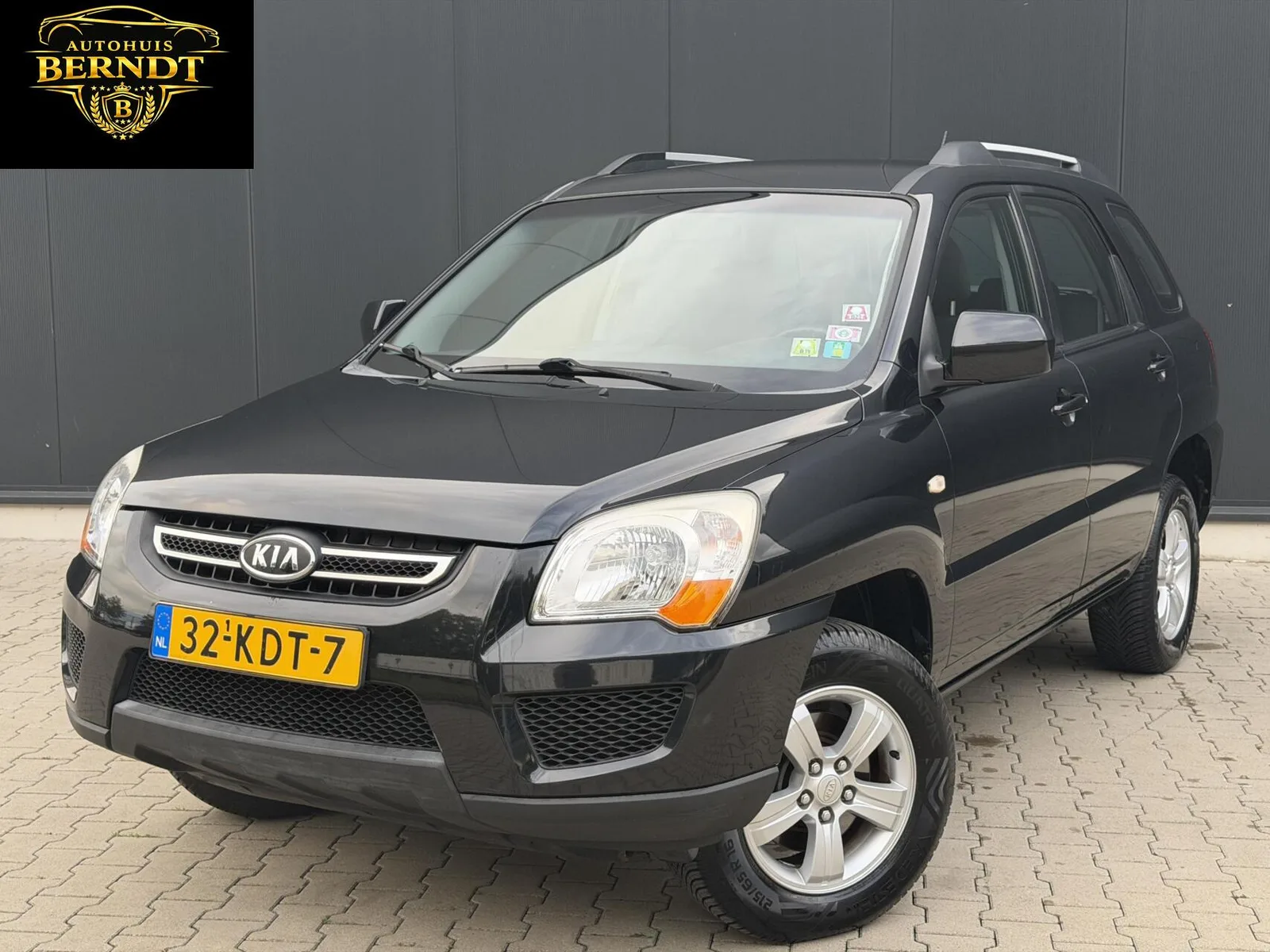 Kia Sportage (2009) — foto 1