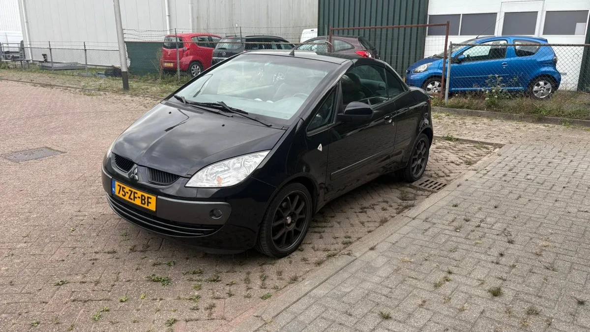 Mitsubishi Colt (2008) — foto 1