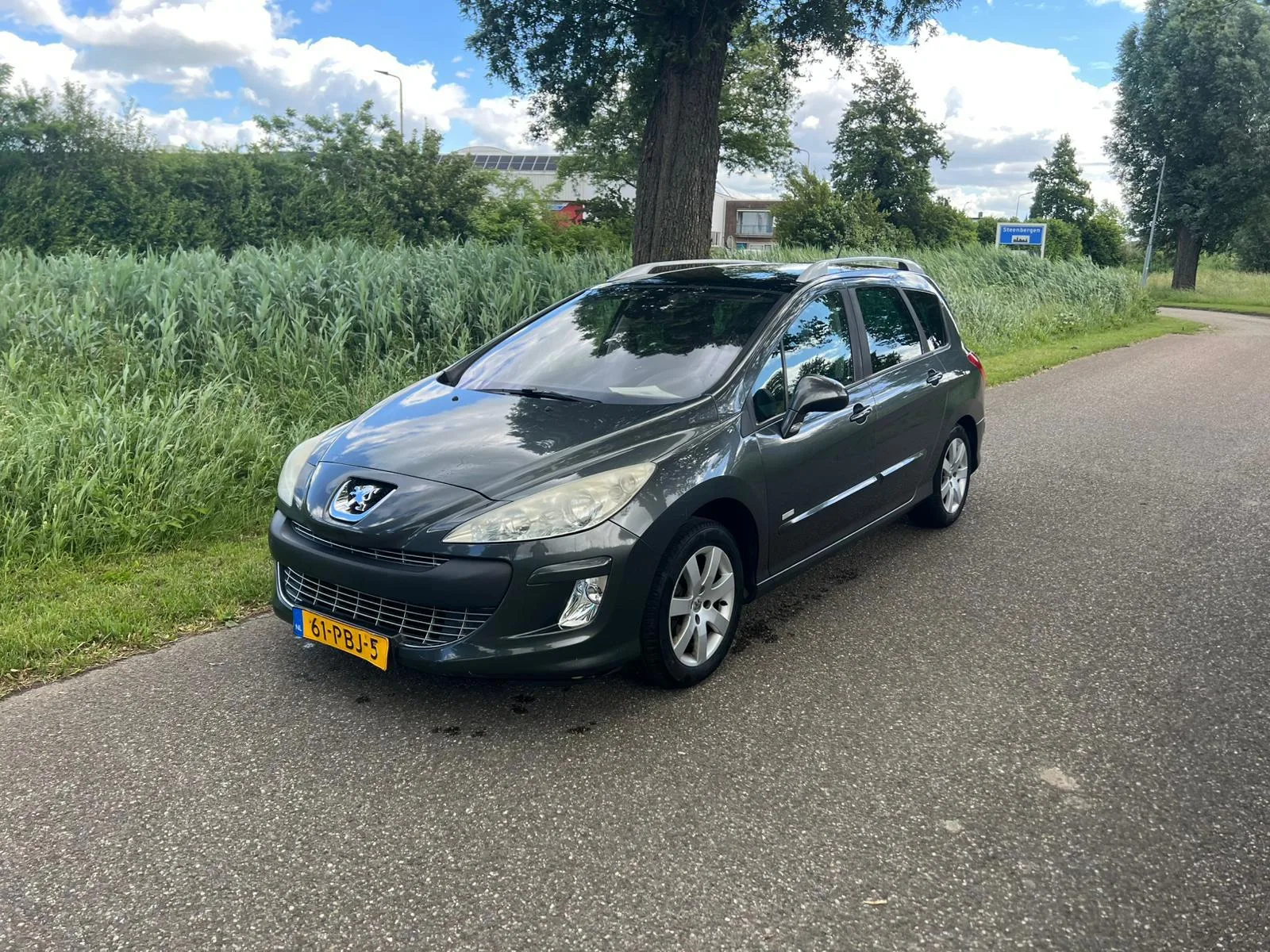 Peugeot 308 (2011) — foto 1
