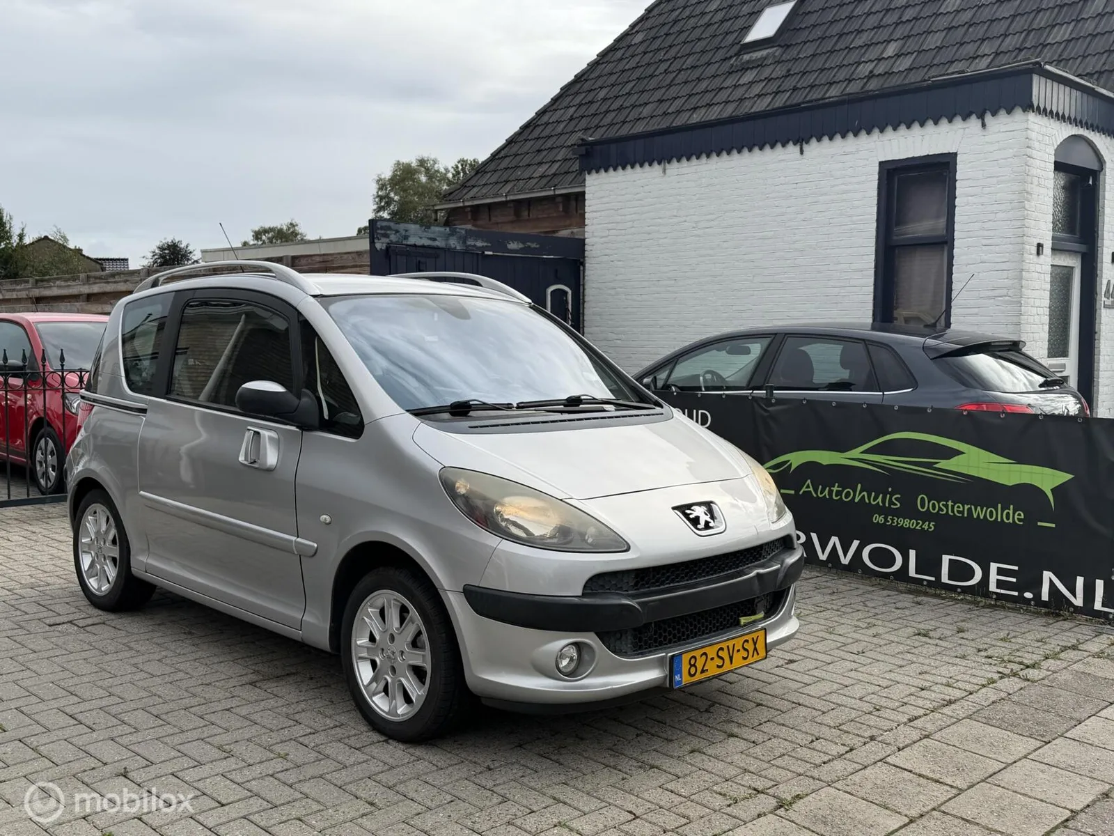Peugeot 1007 (2006) — foto 1