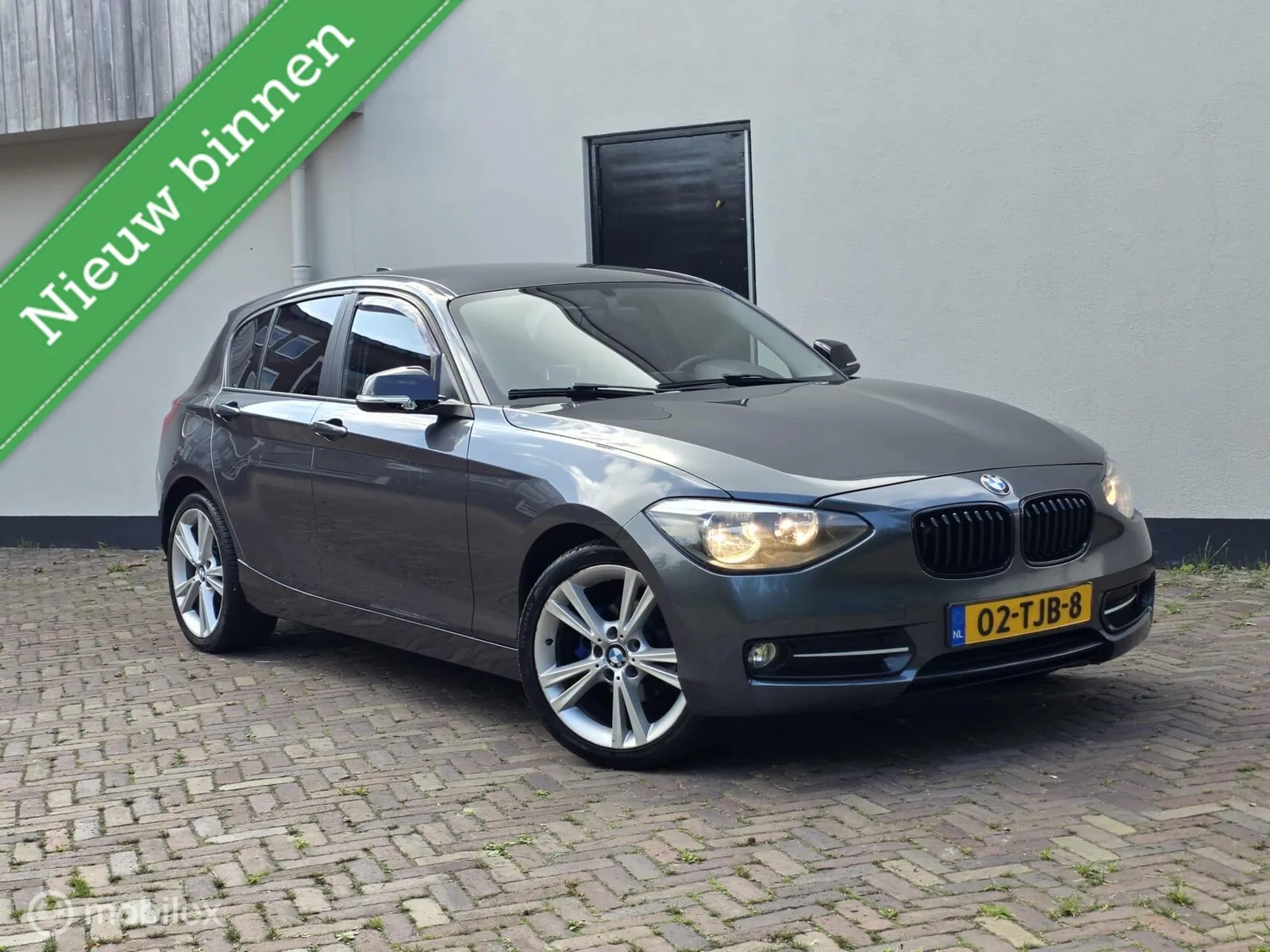 BMW 1-Serie (2012) — foto 1