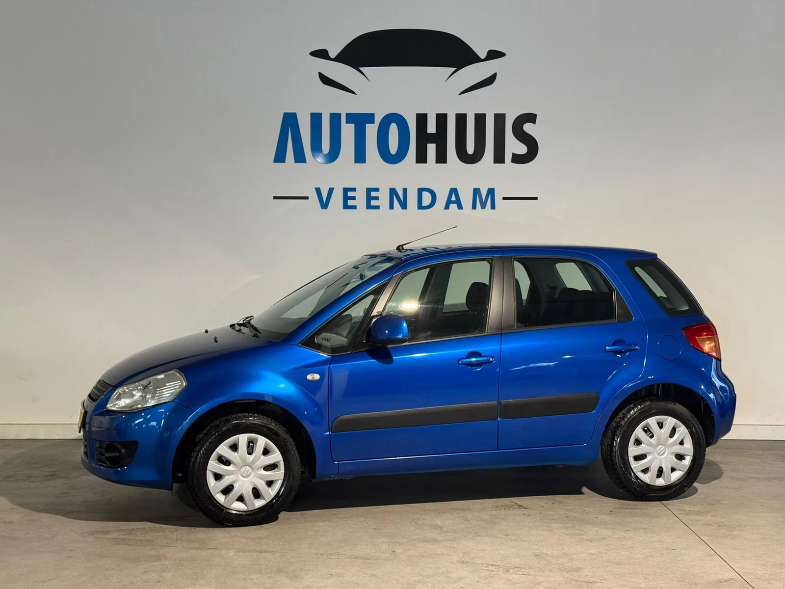 Suzuki SX4 (2006) — foto 1