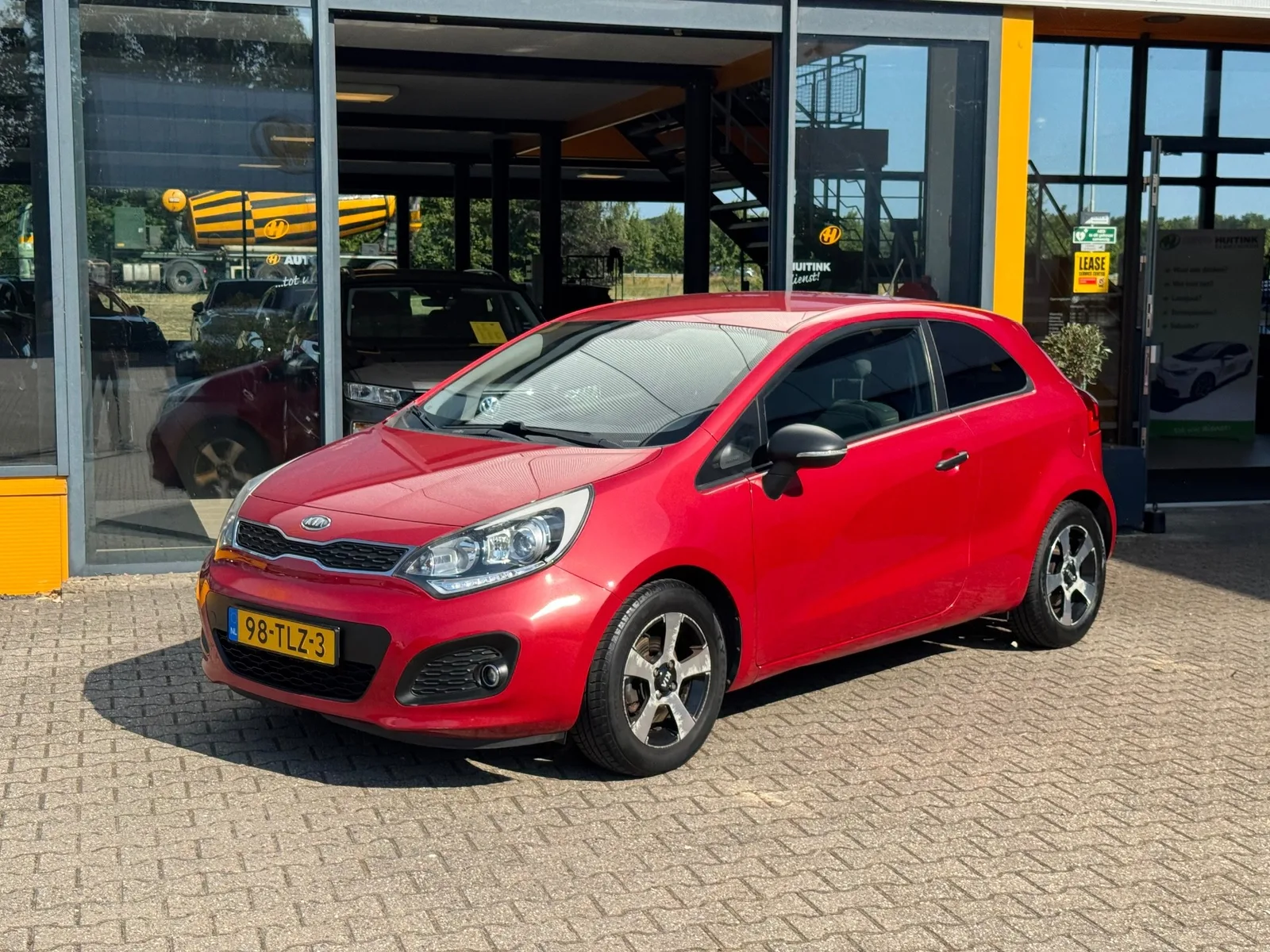 Kia Rio (2012) — foto 1
