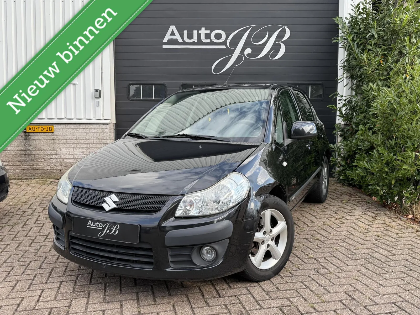 Suzuki SX4 (2006) — foto 1