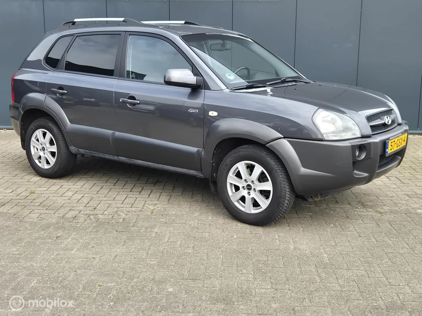 Hyundai Tucson (2008) — foto 1