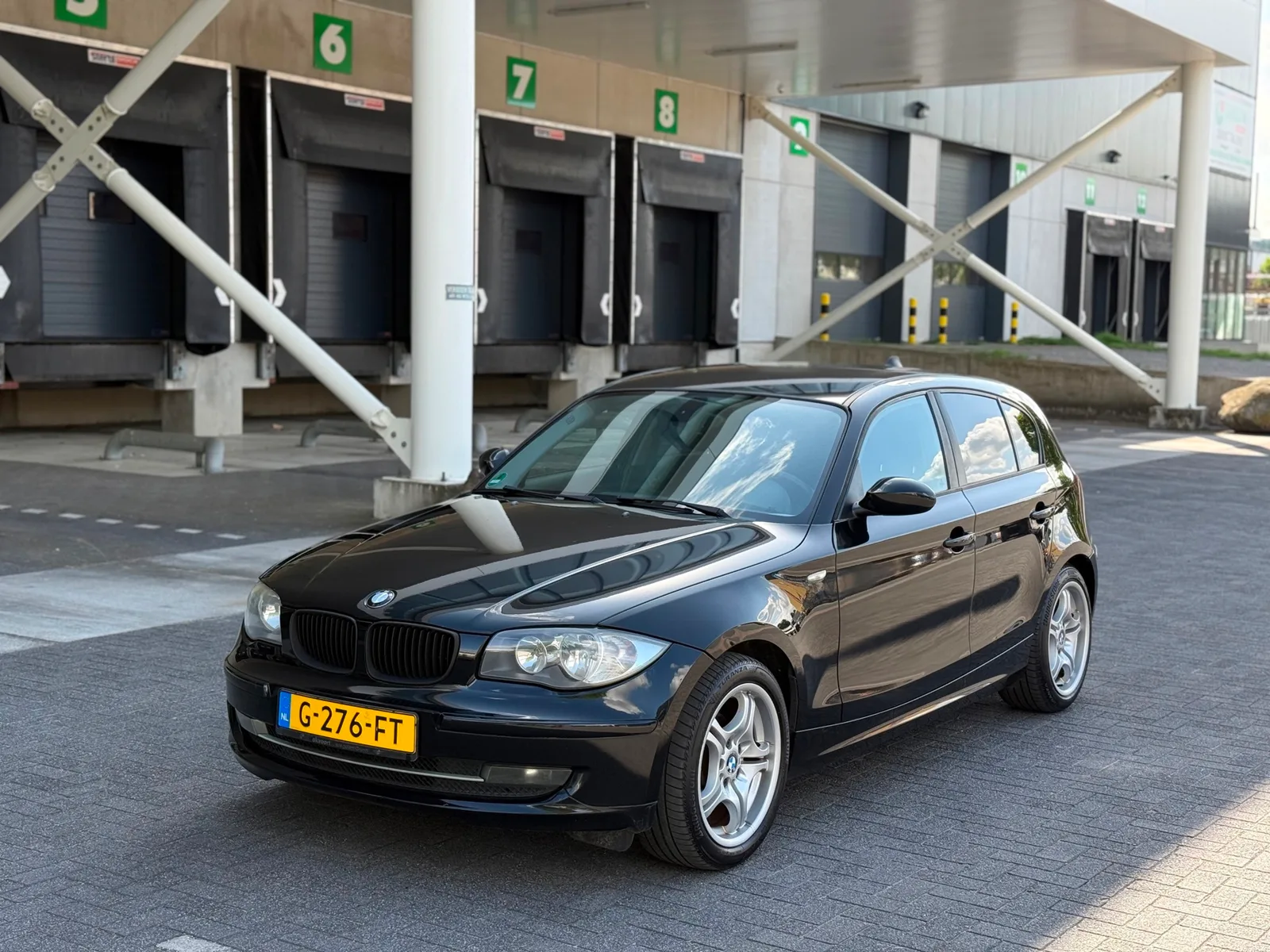 BMW 1-Serie (2009) — foto 1