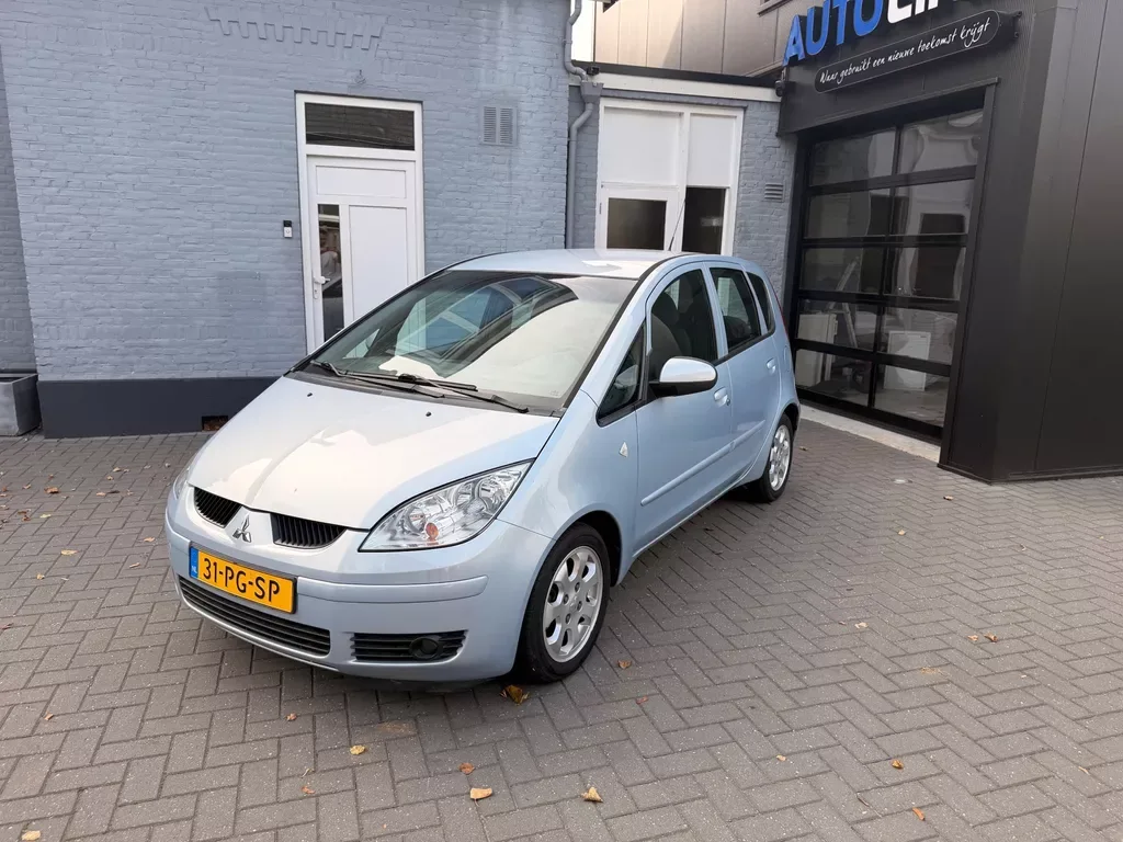 Mitsubishi Colt (2004) — foto 1