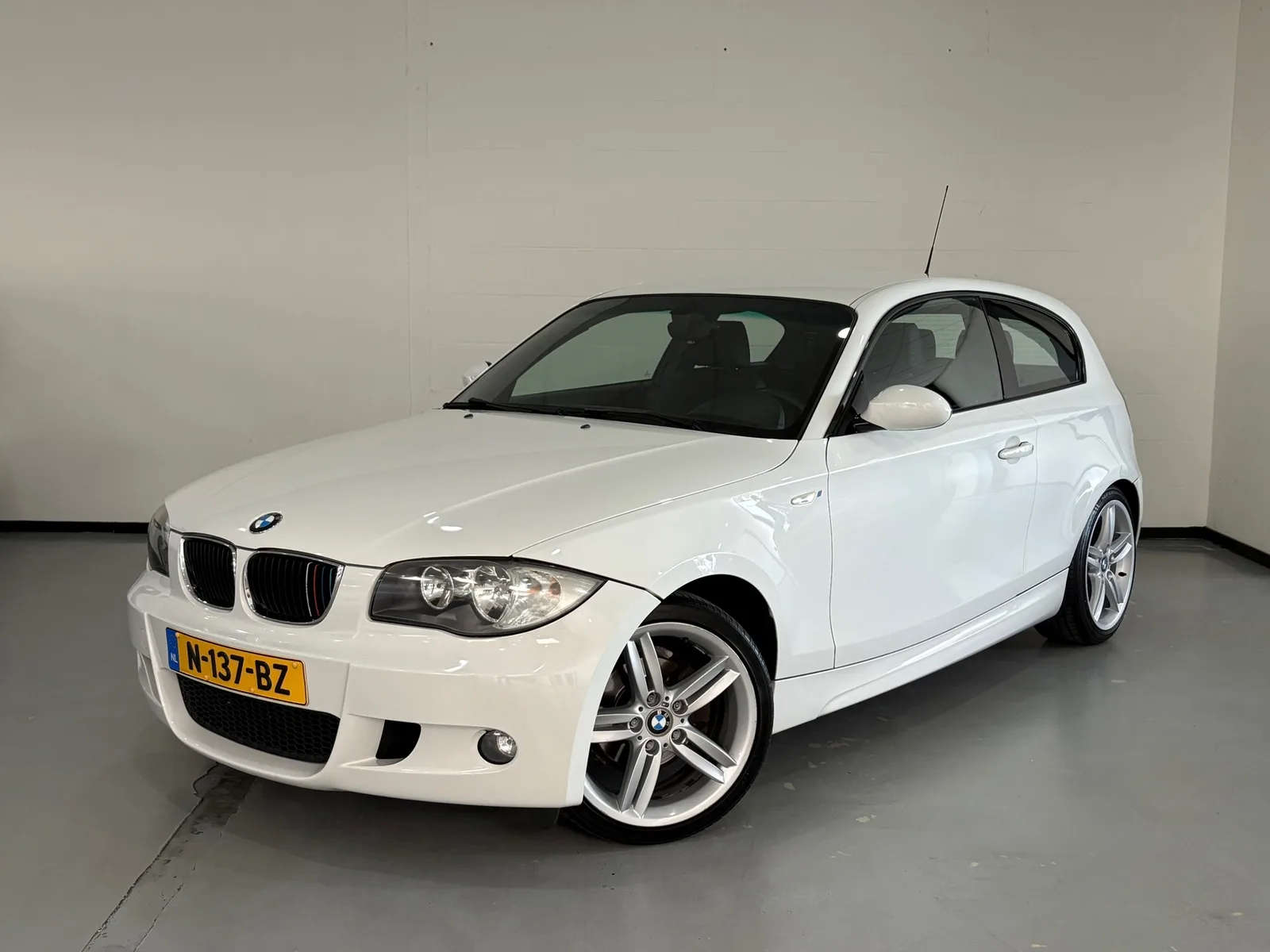 BMW 1-Serie (2008) — foto 1