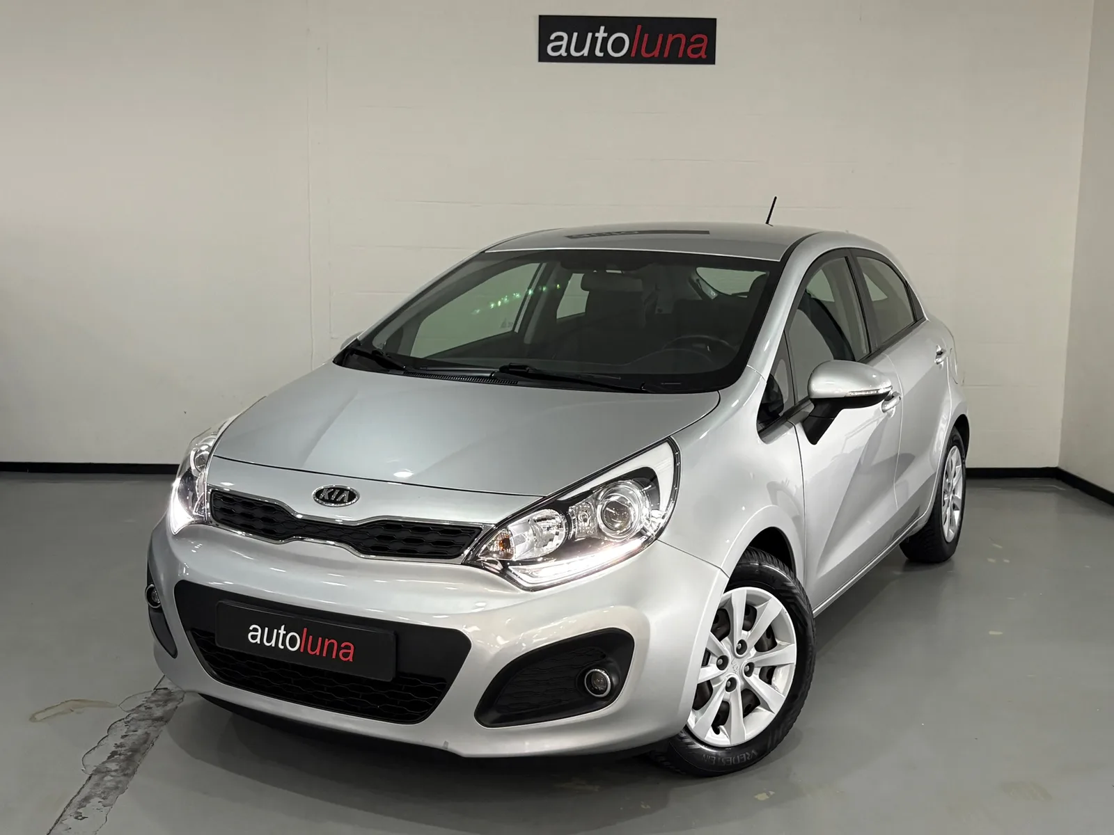 Kia Rio (2011) — foto 1