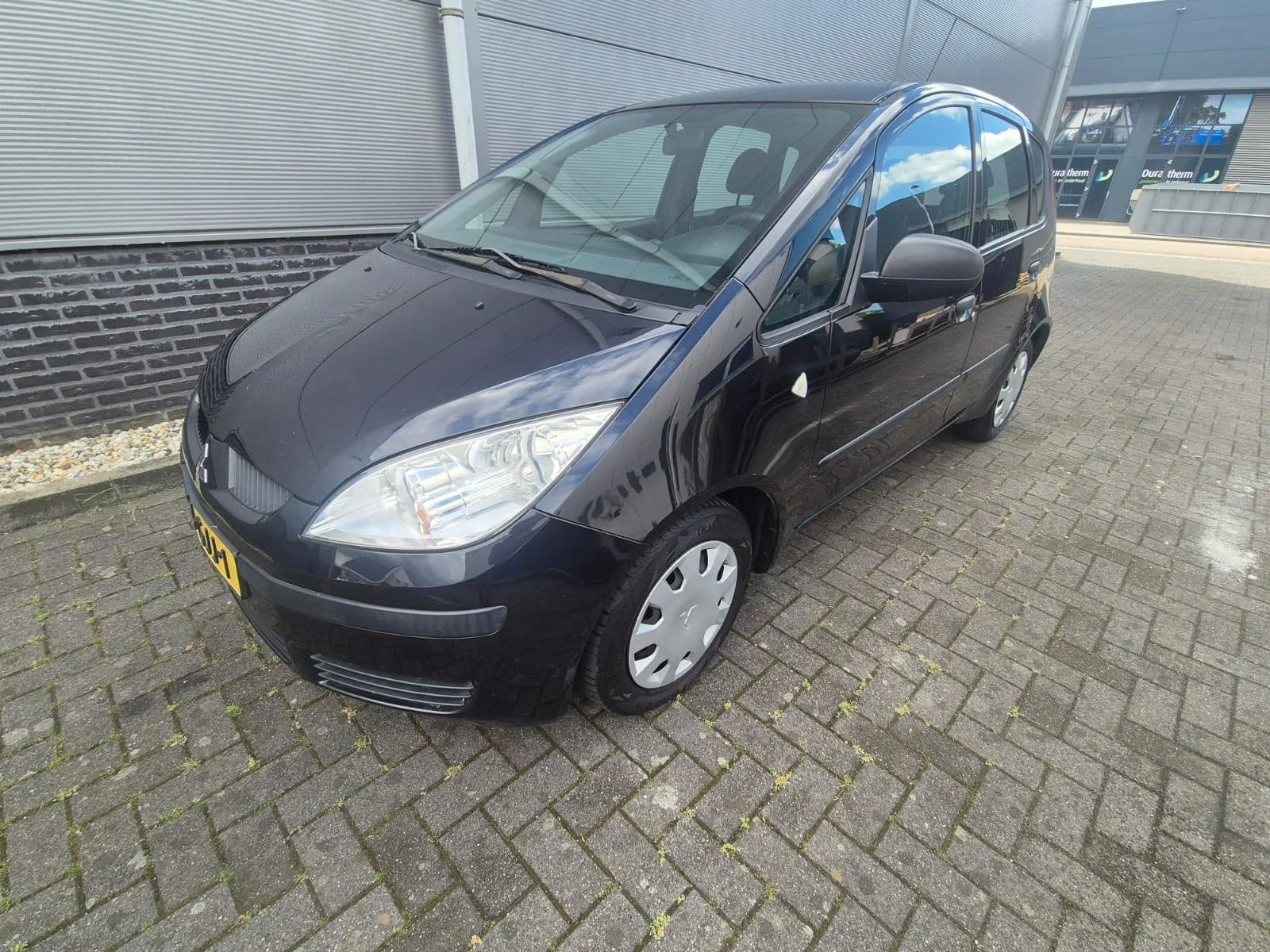 Mitsubishi Colt (2008) — foto 1
