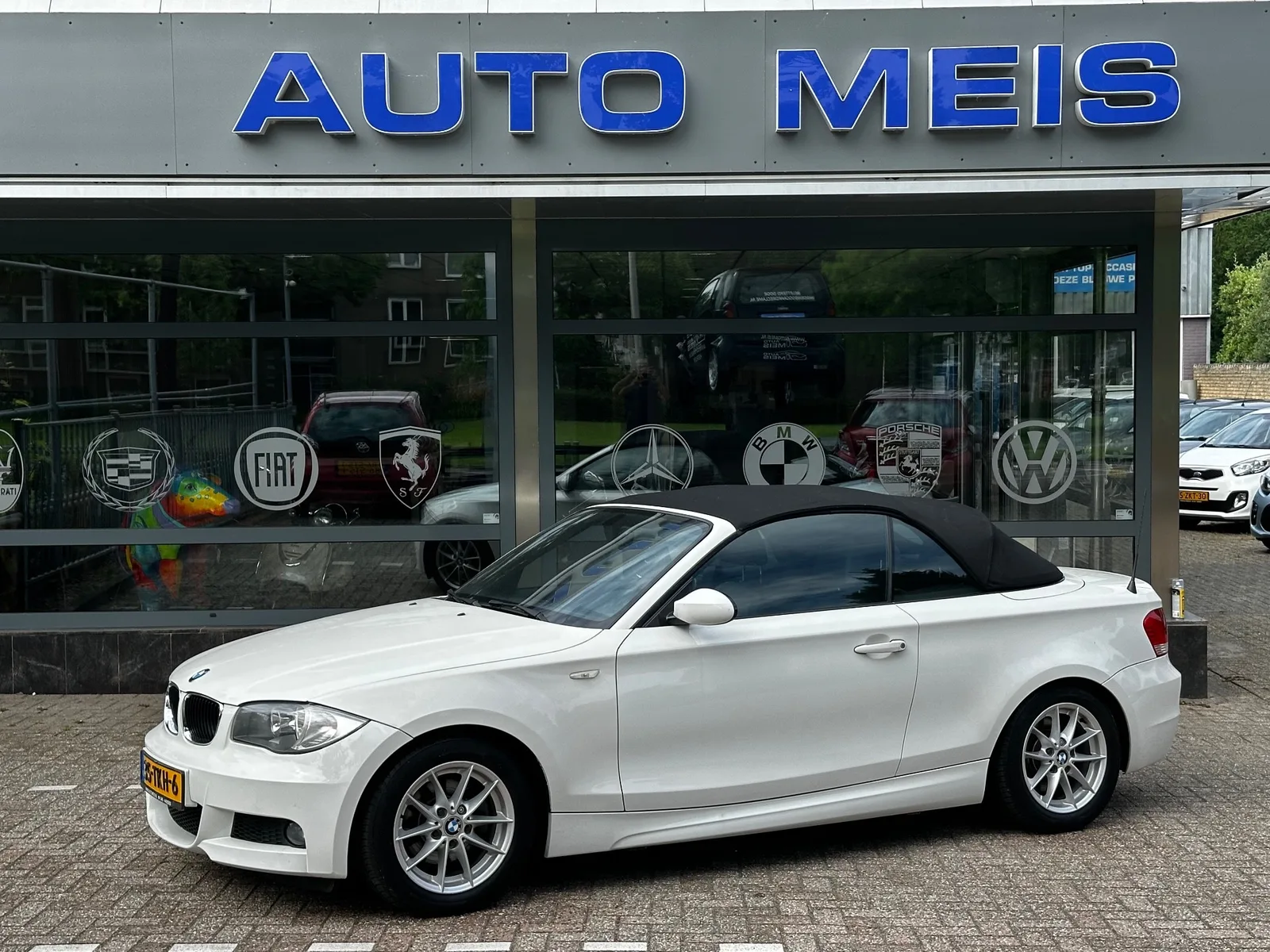 BMW 1-Serie (2009) — foto 1