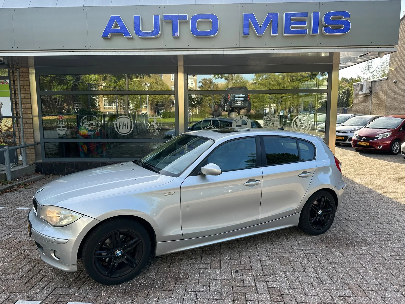 BMW 1-Serie (2004) — foto 1