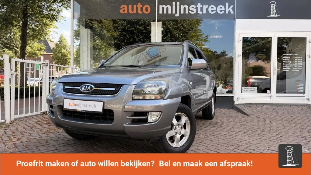 Kia Sportage (2009) — foto 1