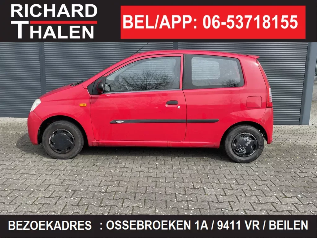 Daihatsu Cuore (2004) — foto 1