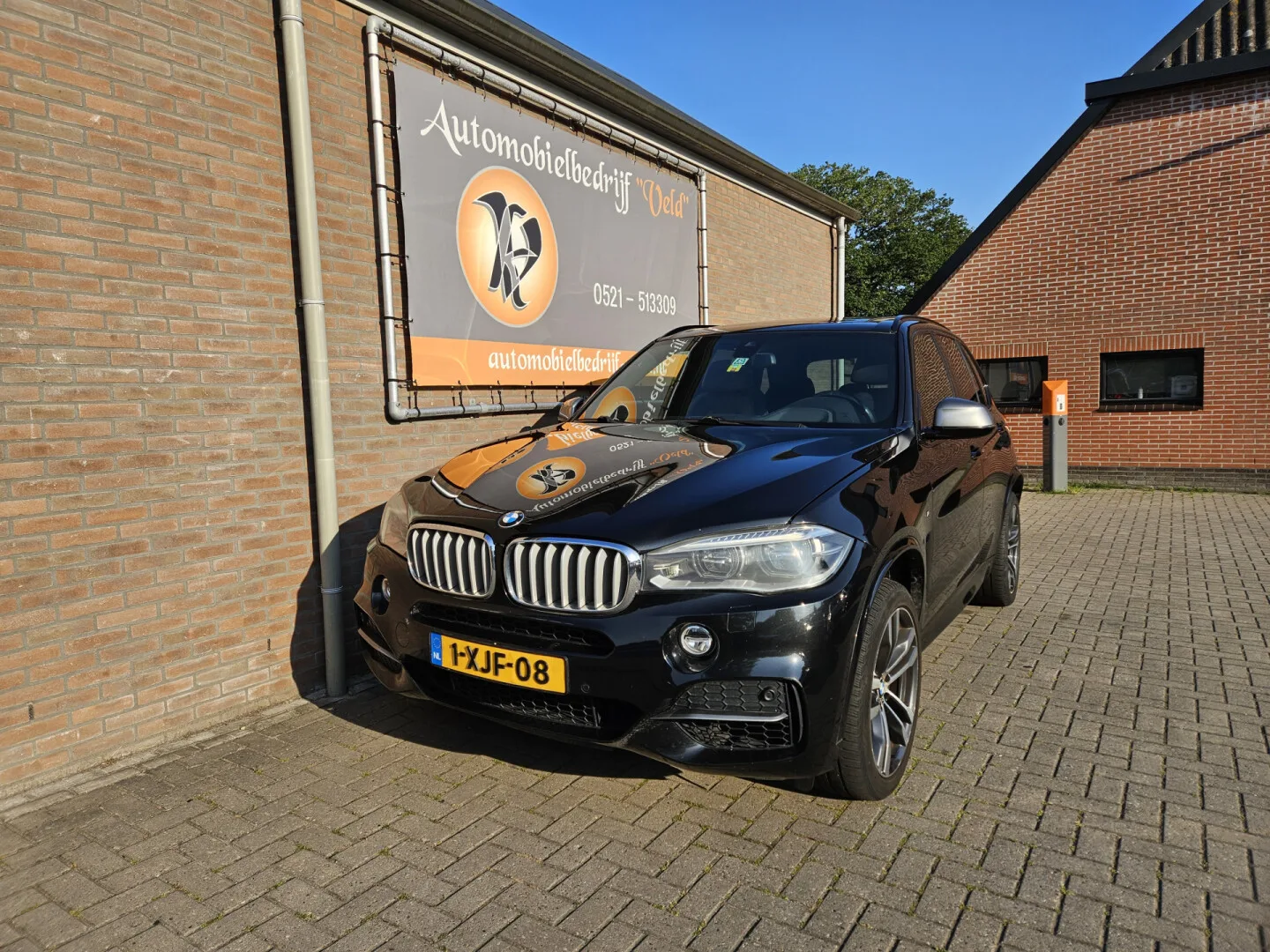 BMW X5 (2014) — foto 1