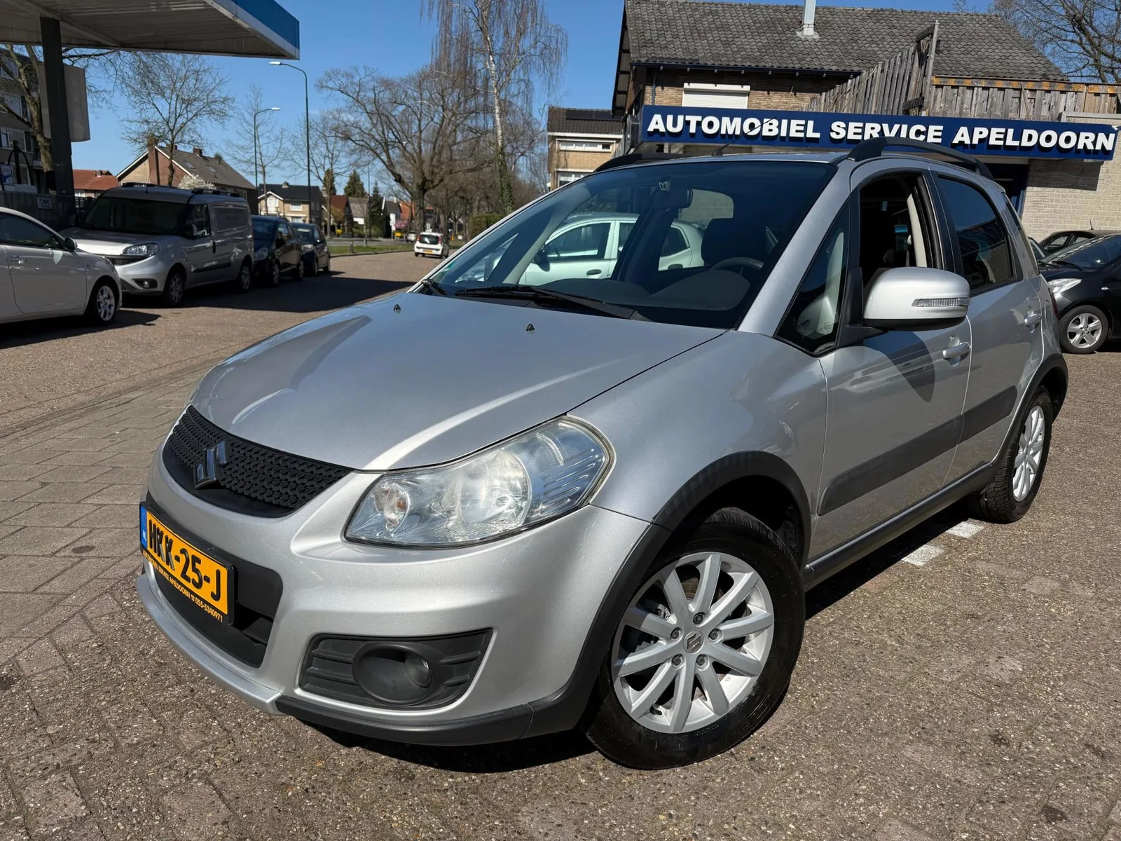 Suzuki SX4 (2011) — foto 1
