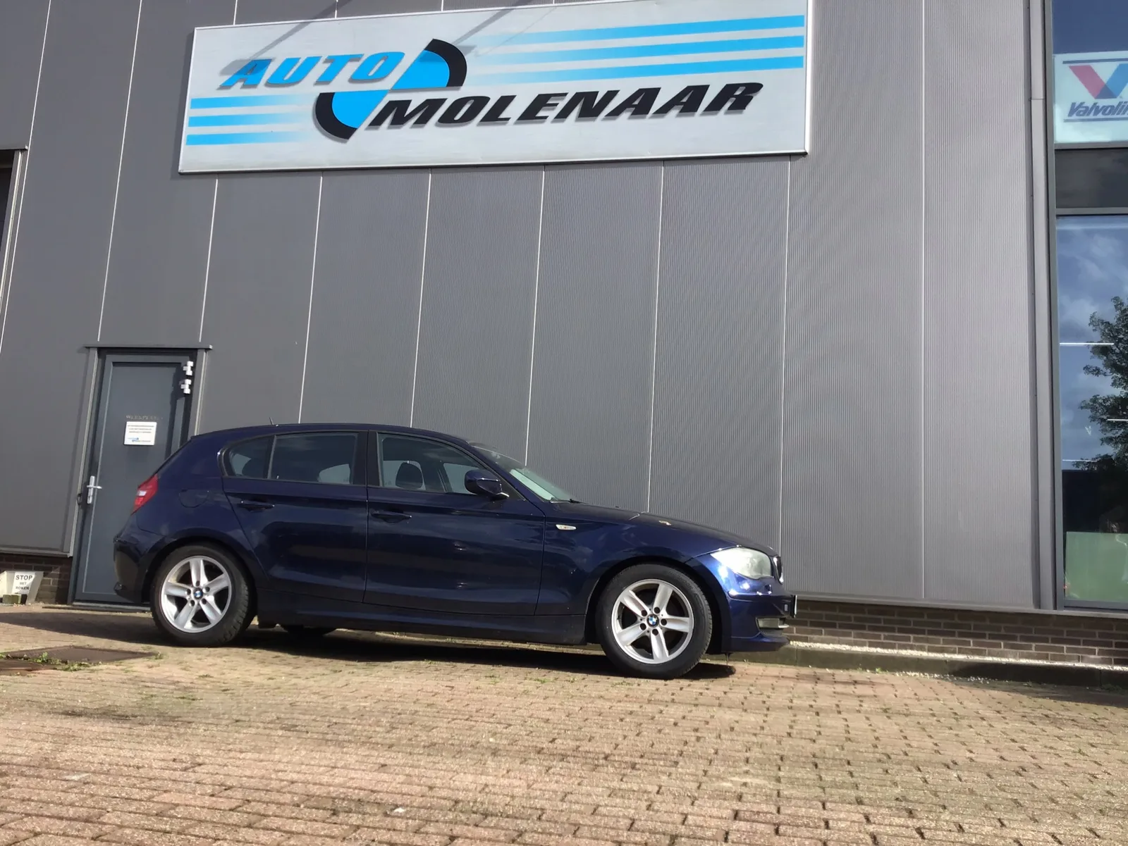 BMW 1-Serie (2011) — foto 1