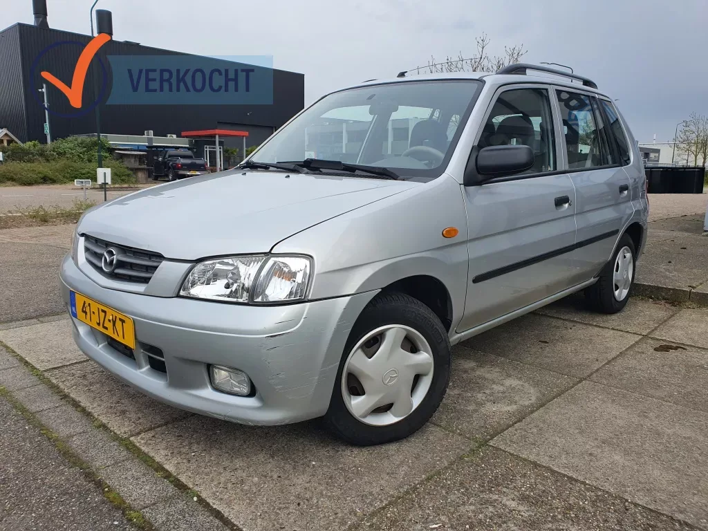 Mazda Demio (2002) — foto 1