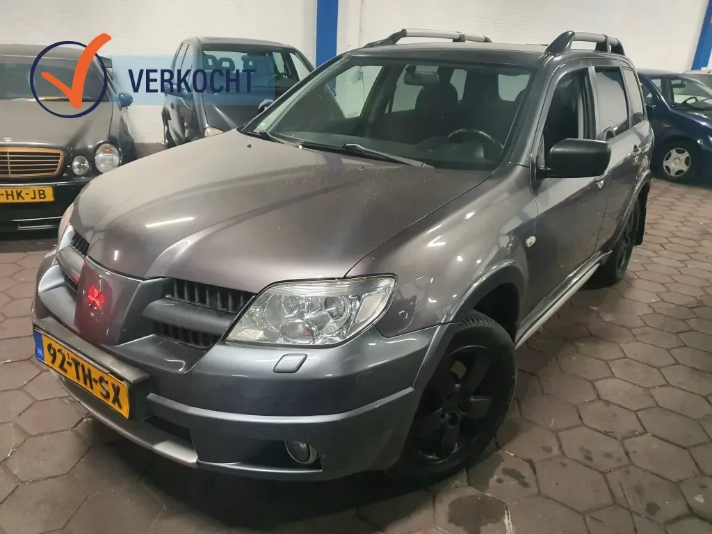 Mitsubishi Outlander (2006) — foto 1