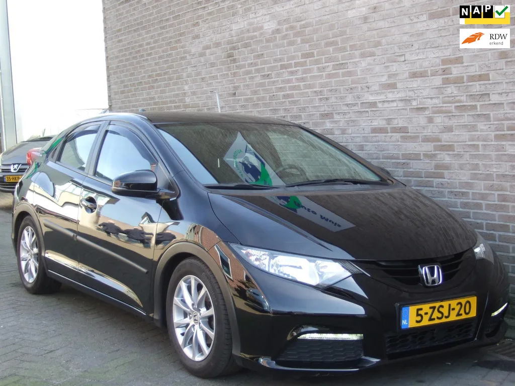 Honda Civic (2015) — foto 1