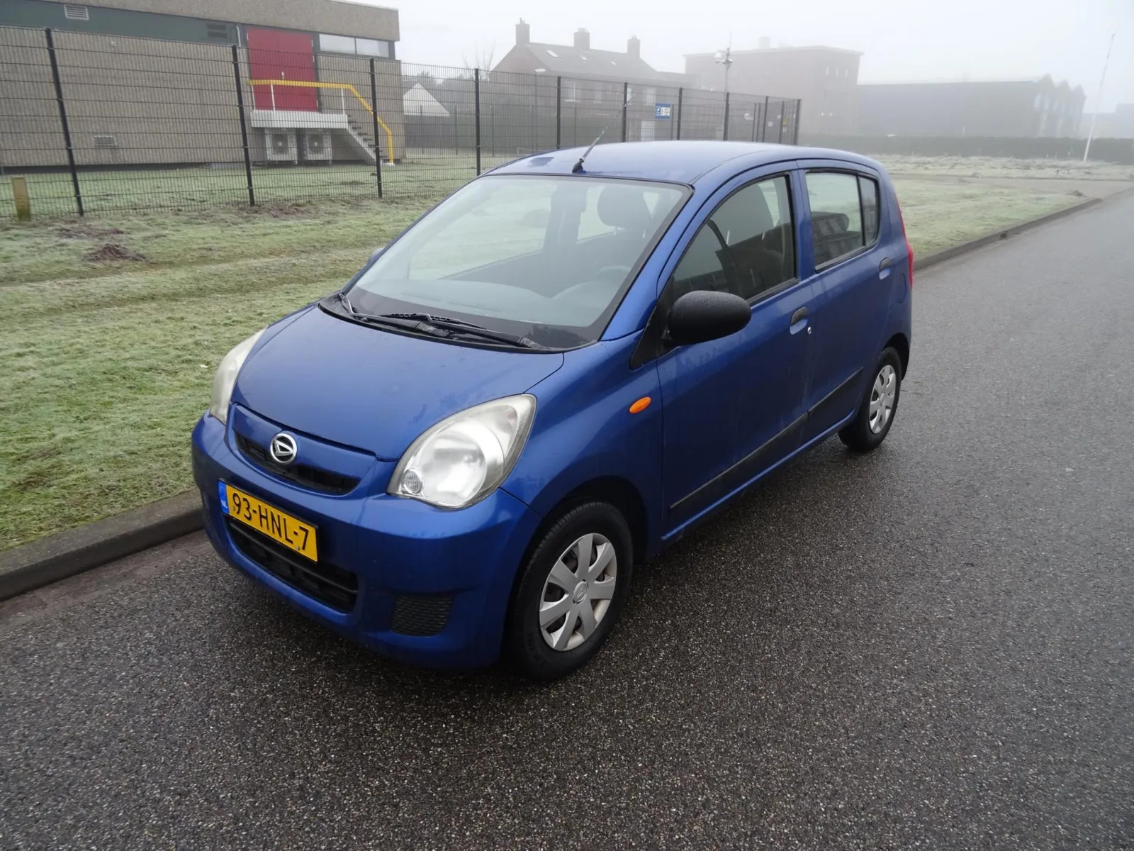 Daihatsu Cuore (2009) — foto 1