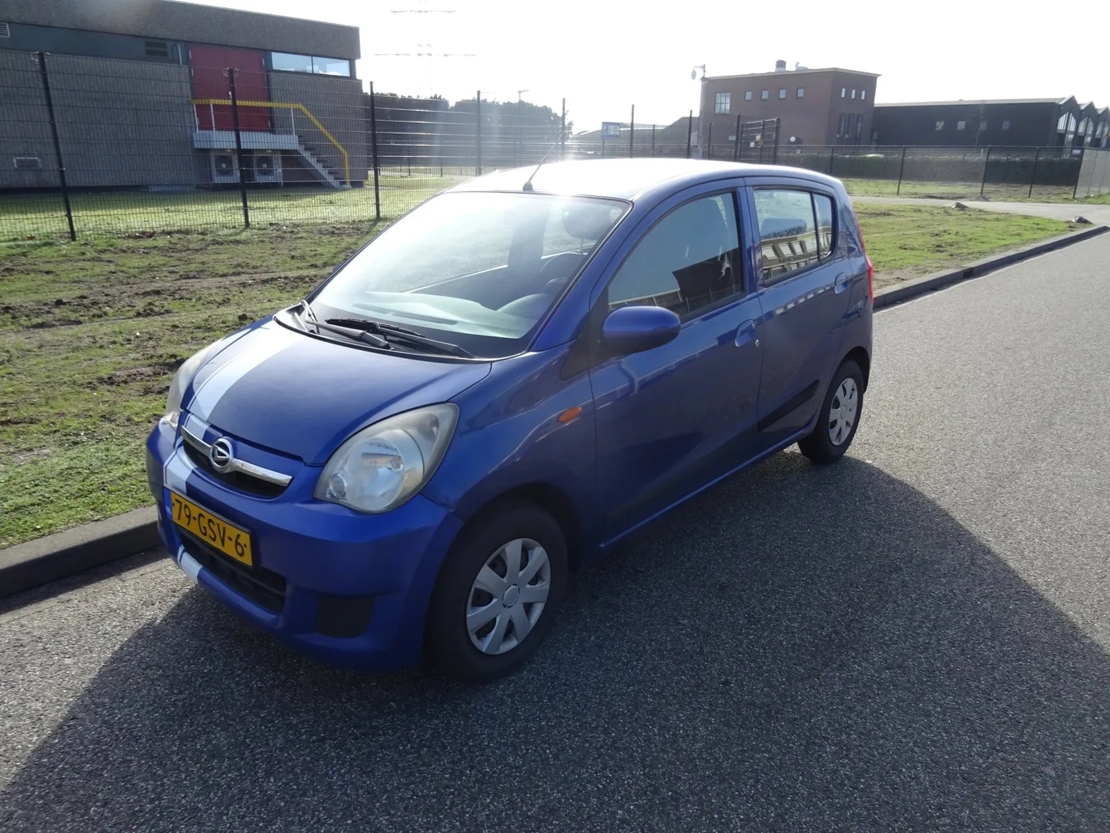 Daihatsu Cuore (2008) — foto 1
