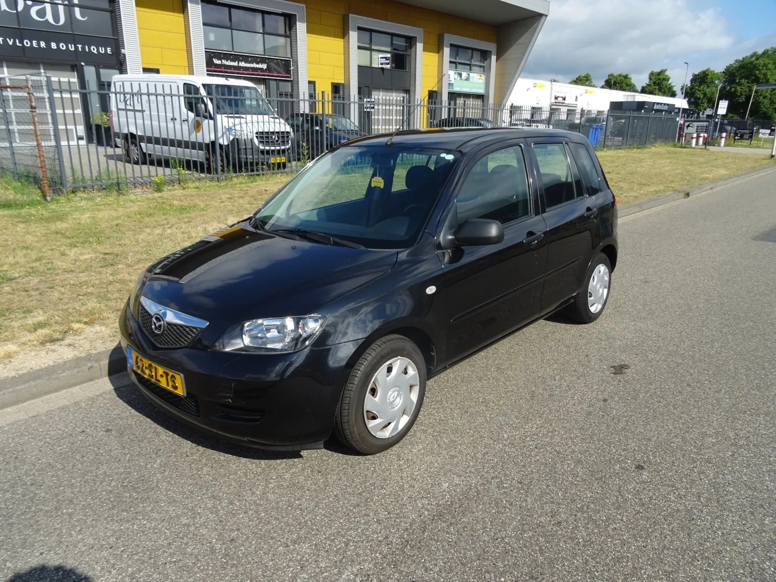 Mazda 2 (2006) — foto 1