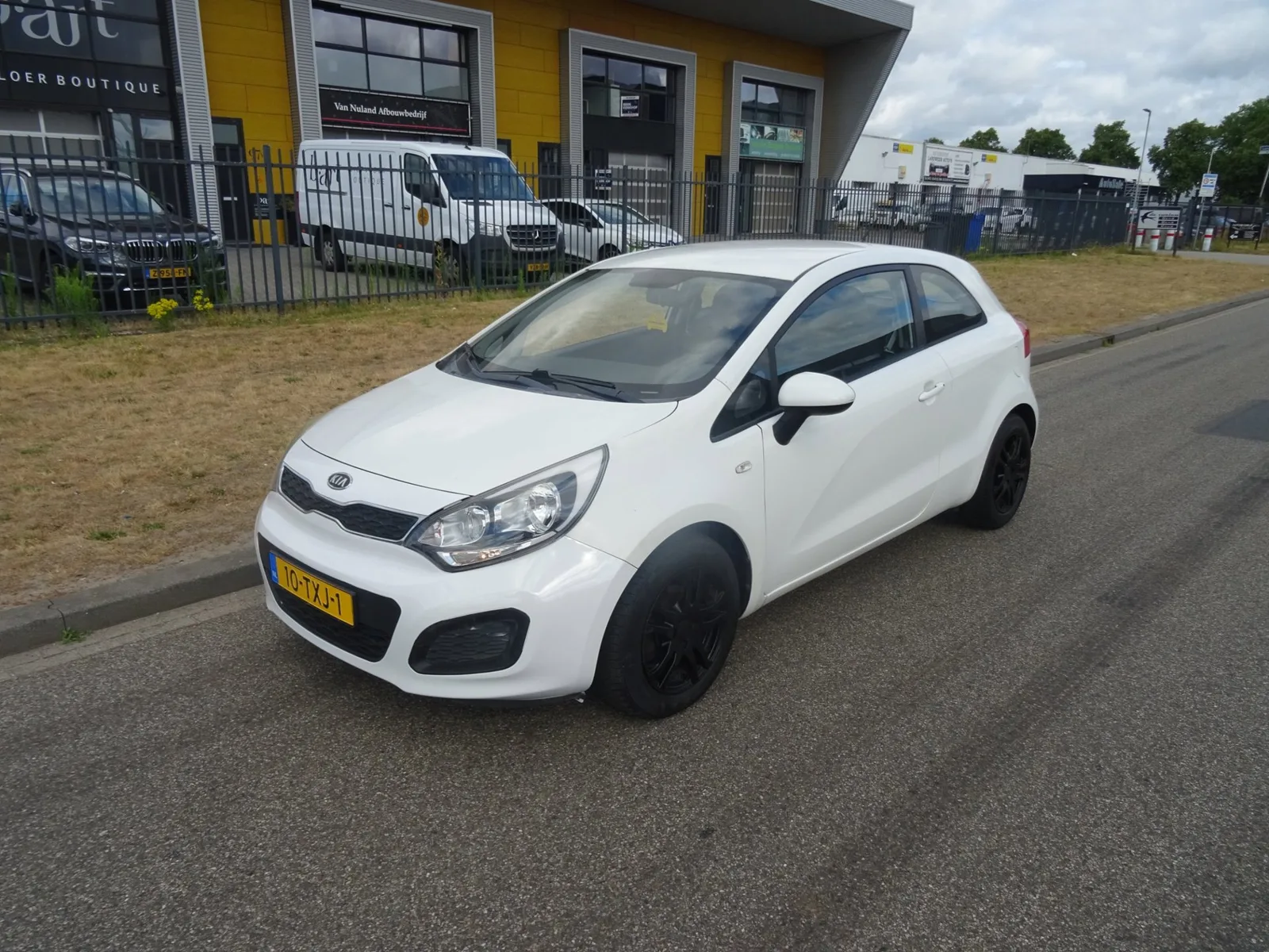 Kia Rio (2012) — foto 1