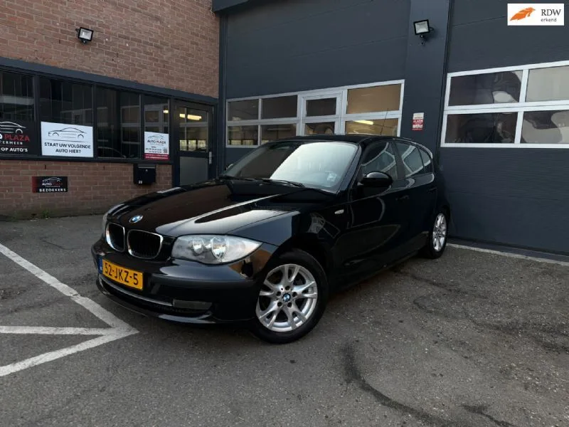 BMW 1-Serie (2009) — foto 1