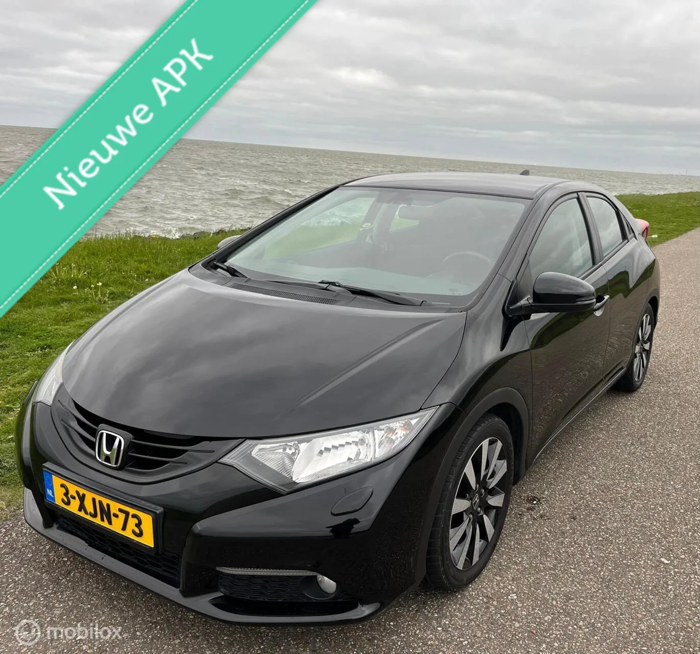 Honda Civic (2014) — foto 1