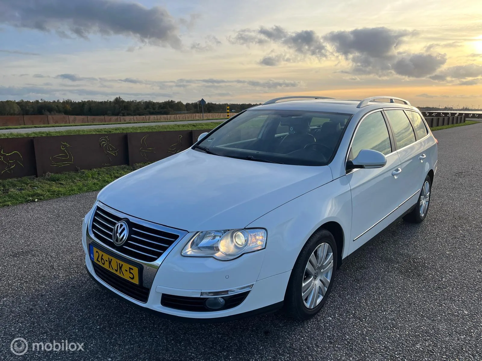 Volkswagen Passat (2009) — foto 1