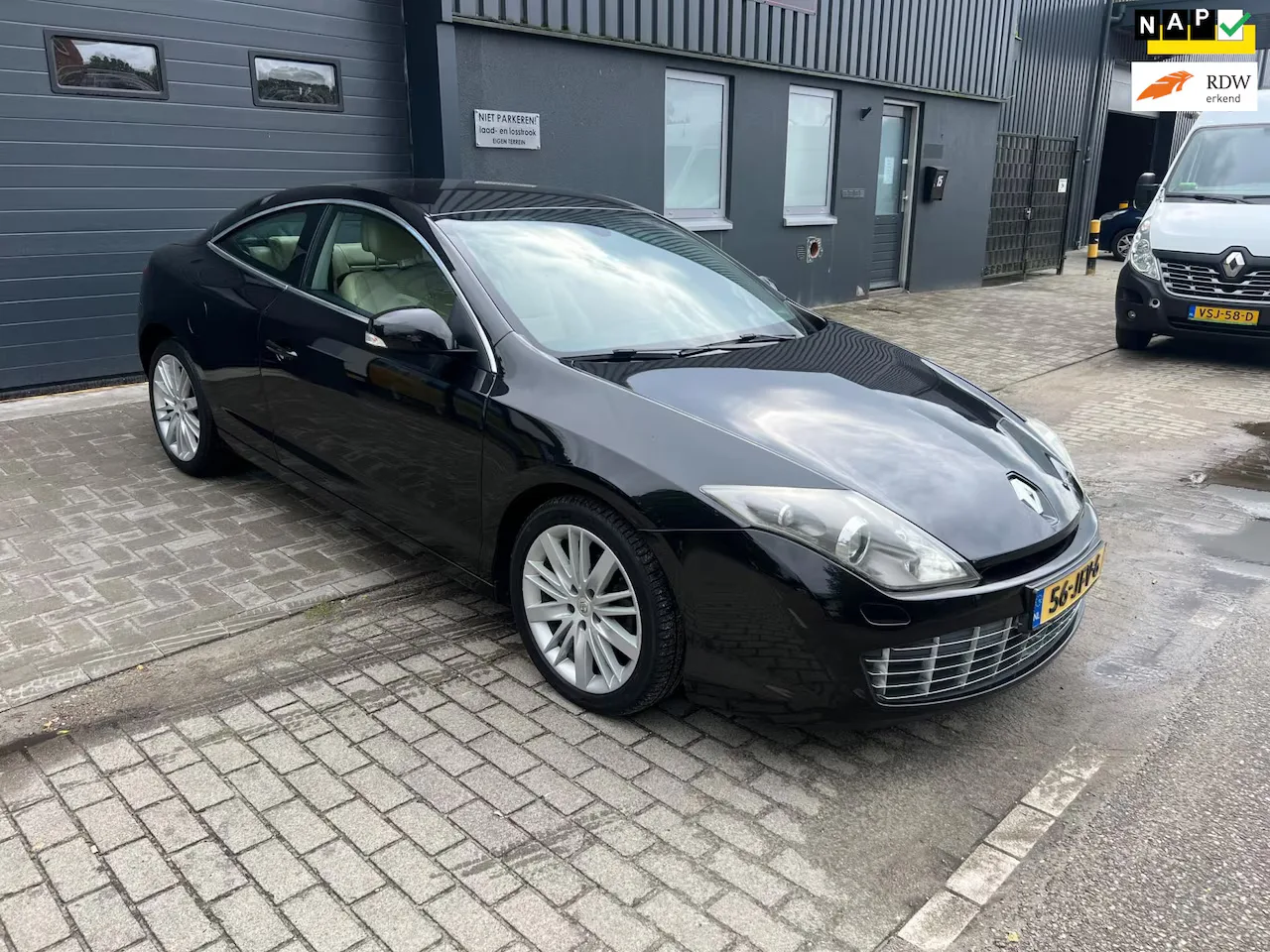 Renault Laguna (2009) — foto 1