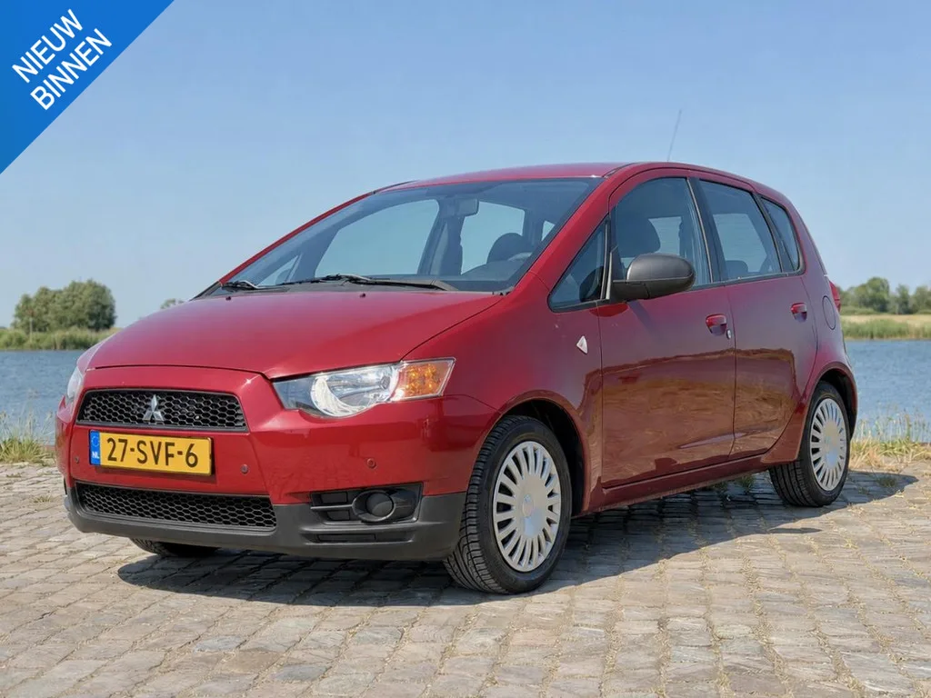 Mitsubishi Colt (2011) — foto 1